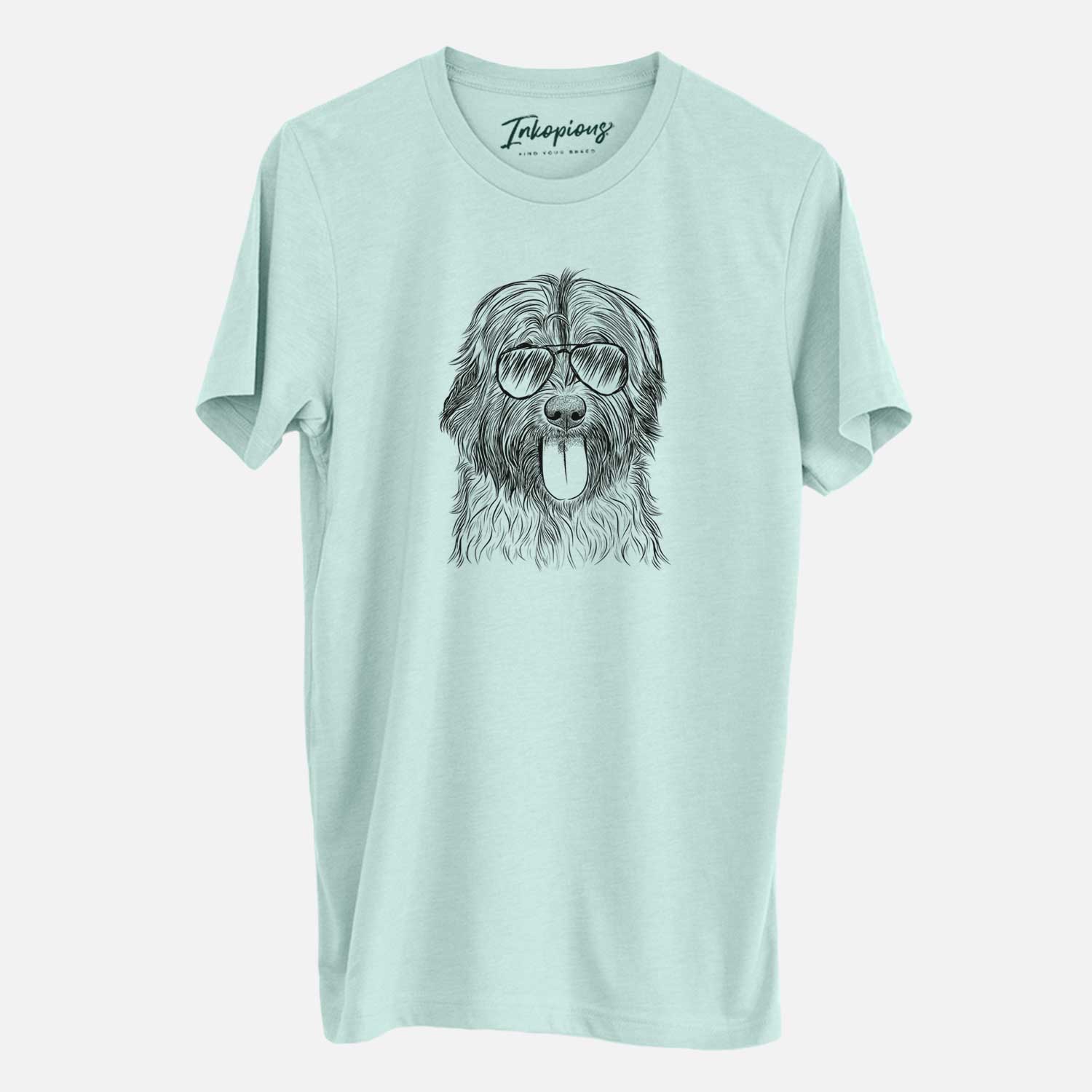 Hand-drawn sketch of Puig the Catalan Sheepdog wearing aviator sunglasses on a Heather Sage Unisex crewneck