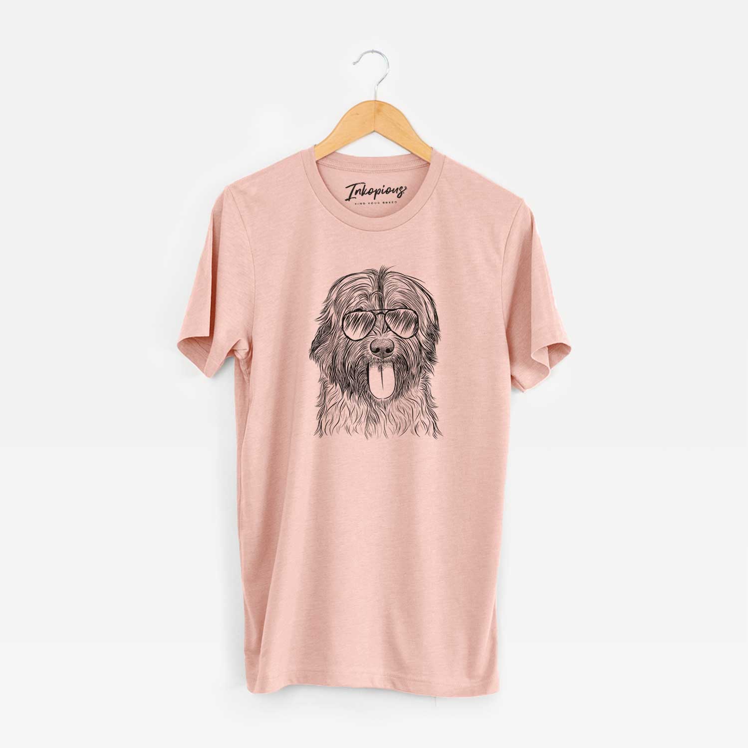 Hand-drawn sketch of Puig the Catalan Sheepdog wearing aviator sunglasses on a Peach Unisex crewneck