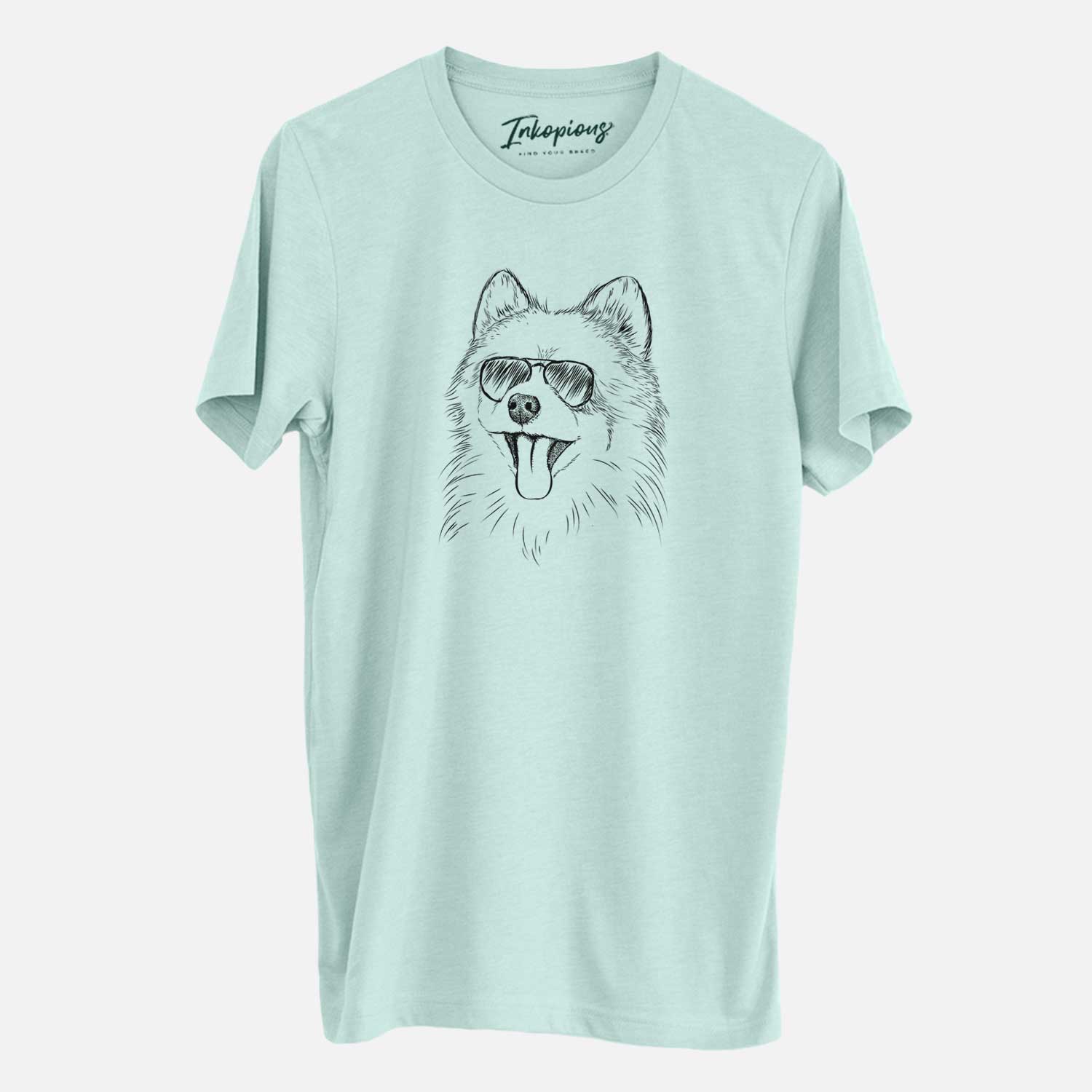 Hand-drawn sketch of Quinn the Pomeranian wearing aviator sunglasses on a Heather Sage Unisex crewneck
