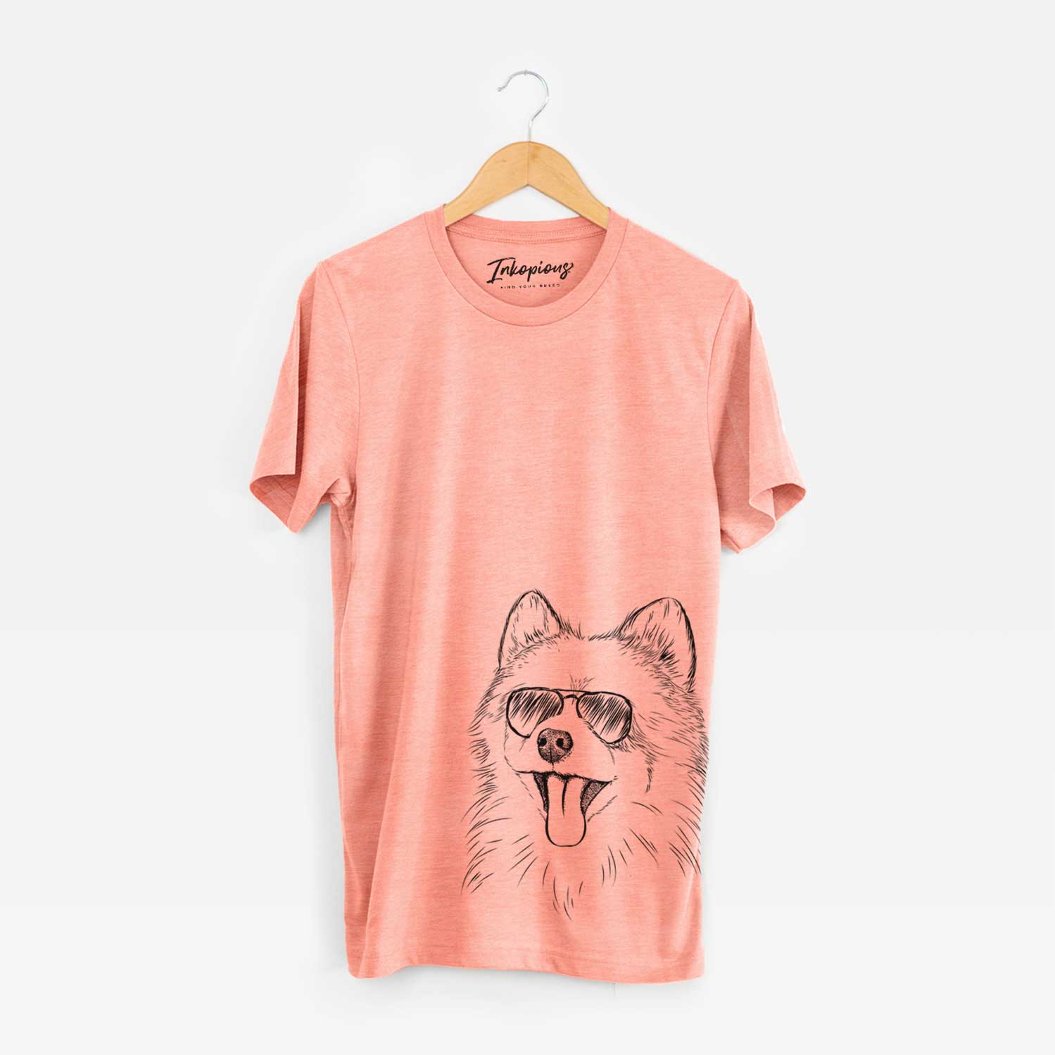 Hand-drawn sketch of Quinn the Pomeranian wearing aviator sunglasses on a Sunset Unisex crewneck