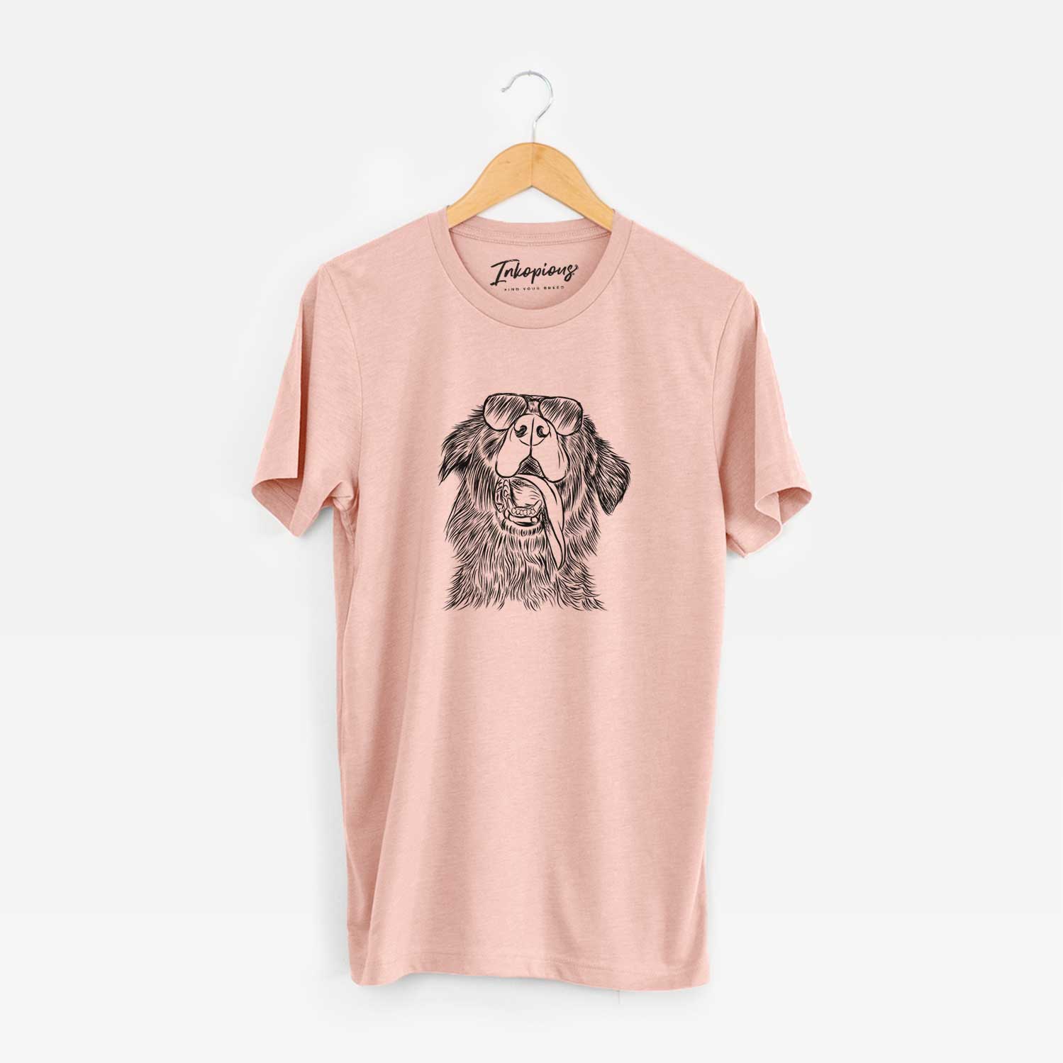 Hand-drawn sketch of Quint the Mixed Breed wearing aviator sunglasses on a Peach Unisex crewneck