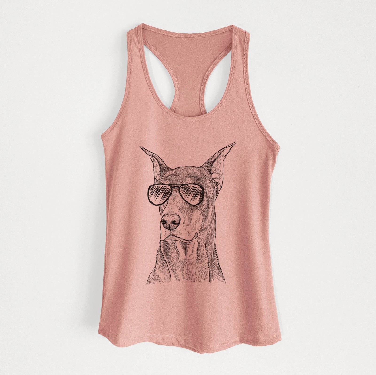 Hand-drawn sketch of RJ the Doberman Pinscher wearing aviator sunglasses on a Desert Pink Women's racerback tanktop