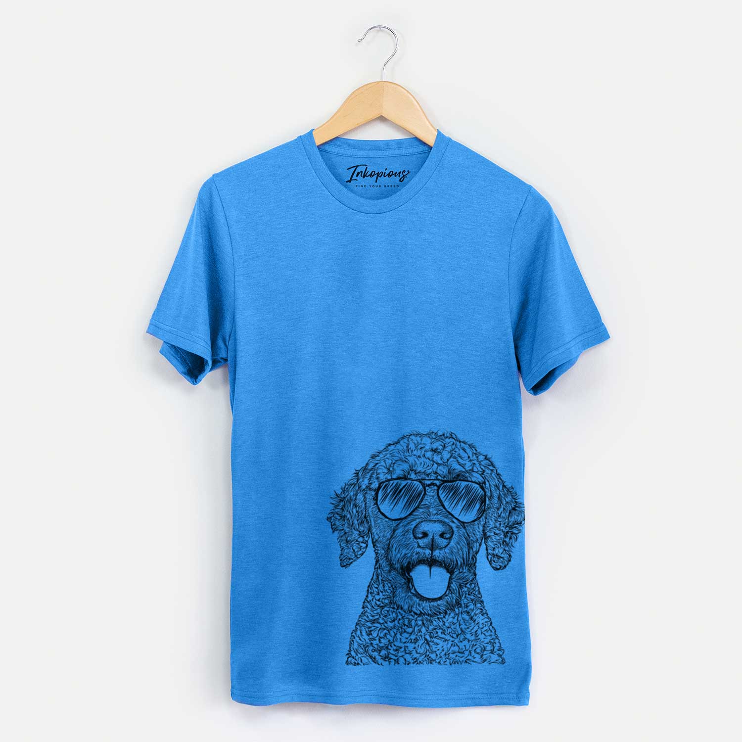 Hand-drawn sketch of Reina the Spanish Water Dog wearing aviator sunglasses on a Blue Unisex crewneck