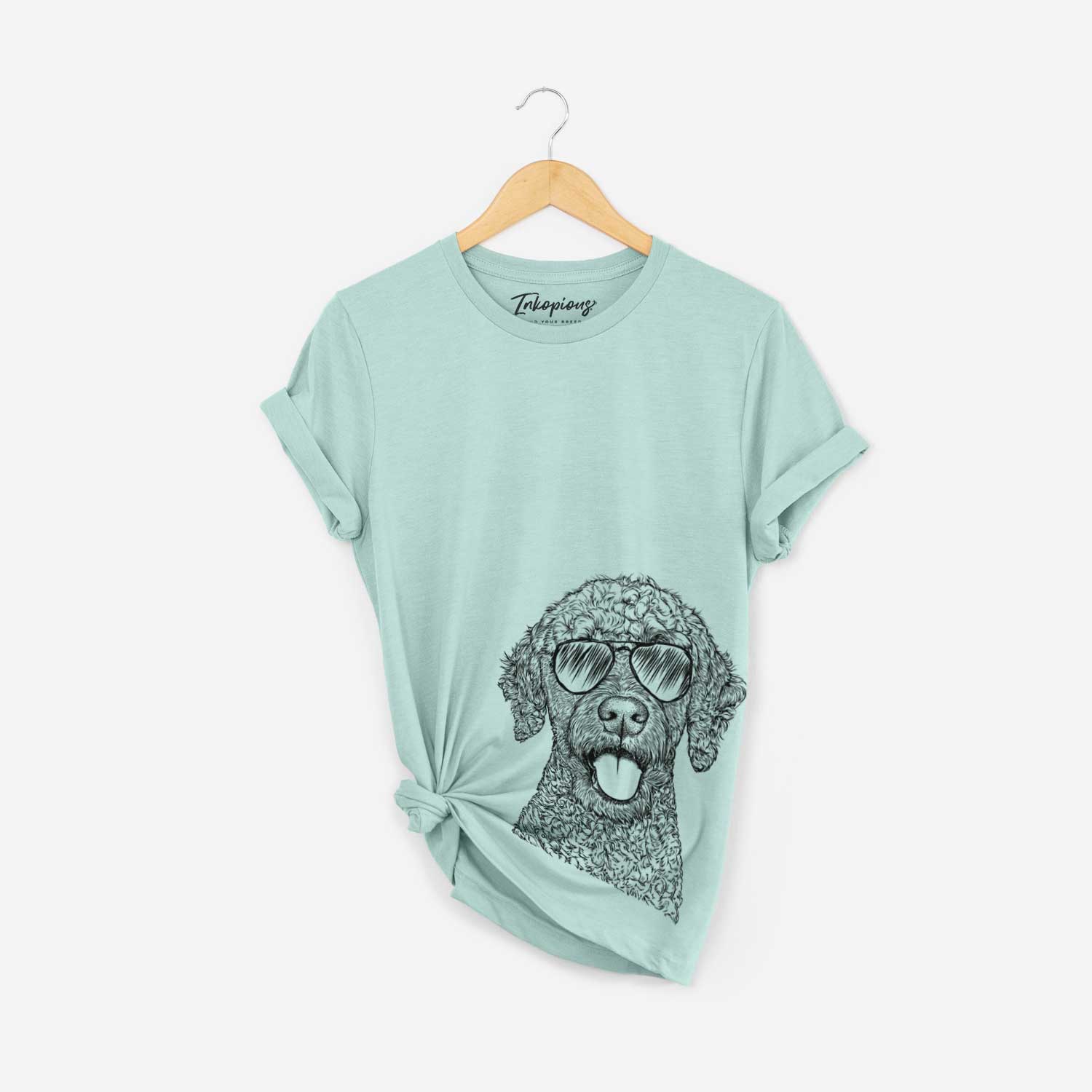 Hand-drawn sketch of Reina the Spanish Water Dog wearing aviator sunglasses on a Heather Sage Bella Canvas Unisex Crewneck