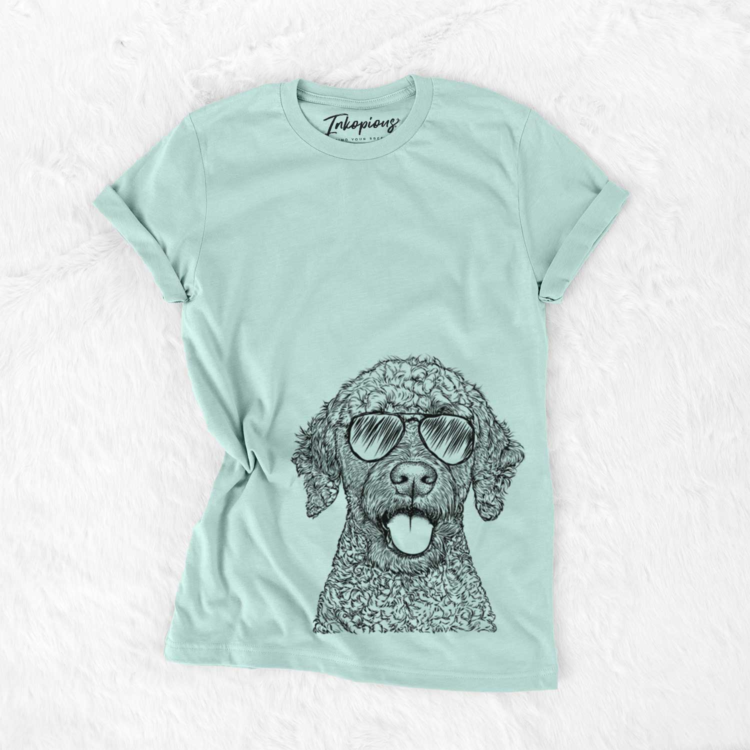 Hand-drawn sketch of Reina the Spanish Water Dog wearing aviator sunglasses on a Heather Sage Unisex crewneck