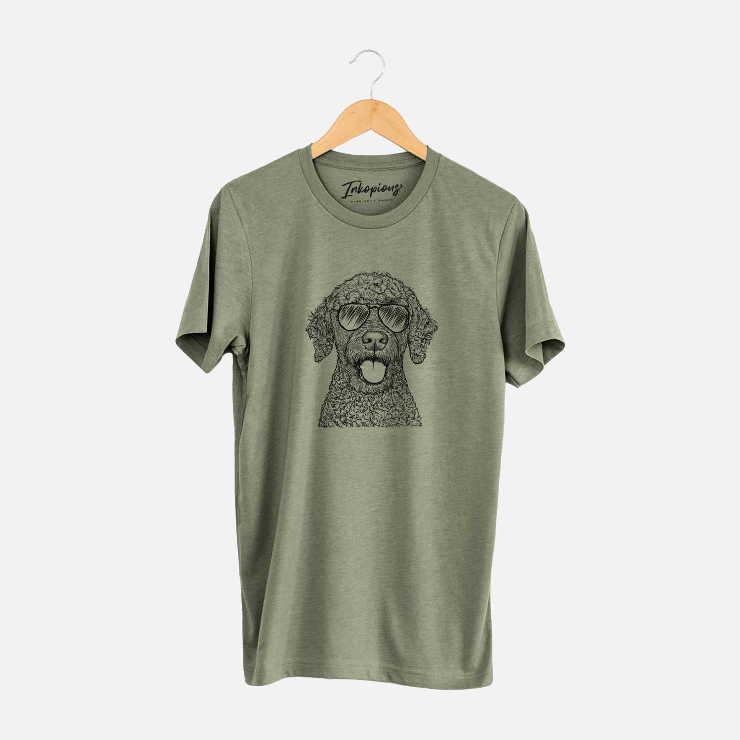 Hand-drawn sketch of Reina the Spanish Water Dog wearing aviator sunglasses on an Olive Unisex crewneck
