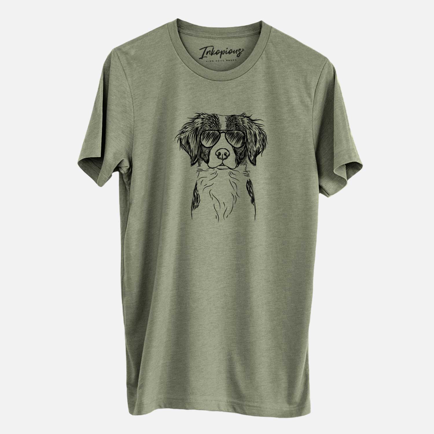 Hand-drawn sketch of Remi the Brittany wearing aviator sunglasses on an Olive Unisex crewneck