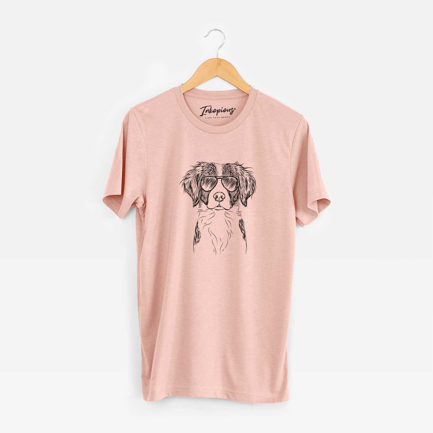 Hand-drawn sketch of Remi the Brittany wearing aviator sunglasses on a Peach Unisex crewneck