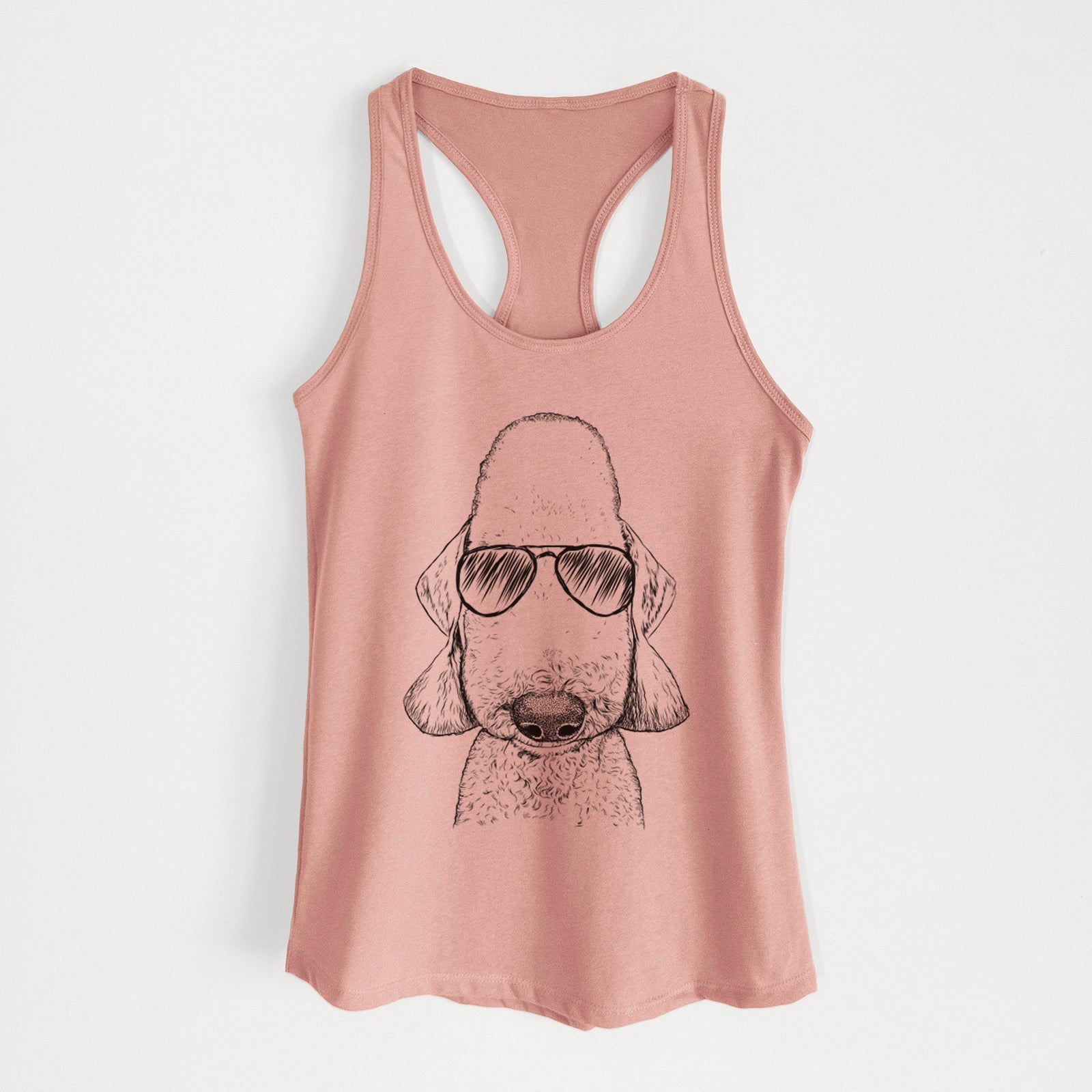 Hand-drawn sketch of Remington the Bedlington Terrier wearing aviator sunglasses on a Desert Pink Women's racerback tanktop