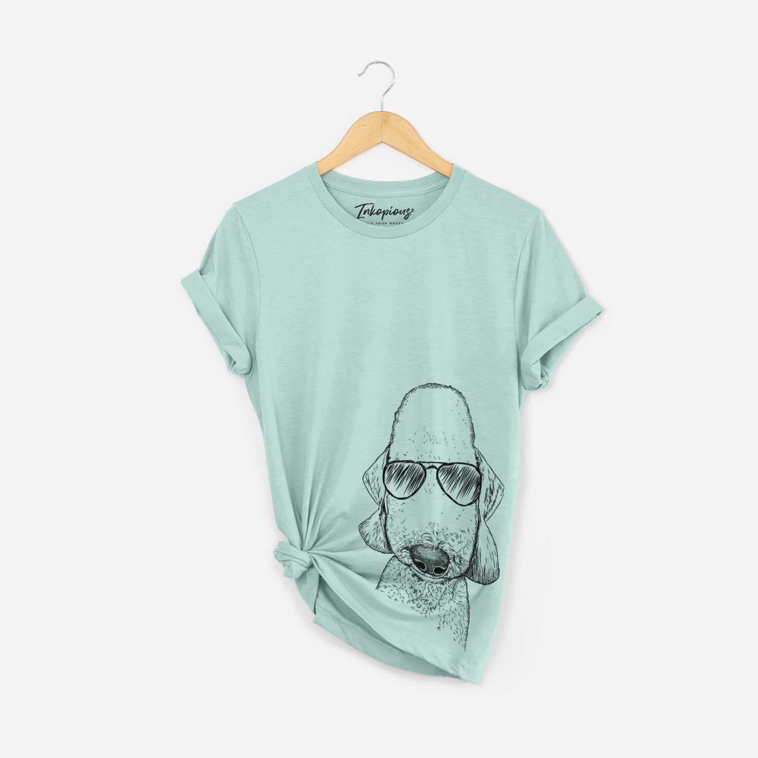 Hand-drawn sketch of Remington the Bedlington Terrier wearing aviator sunglasses on a Heather Sage Bella Canvas Unisex Crewneck
