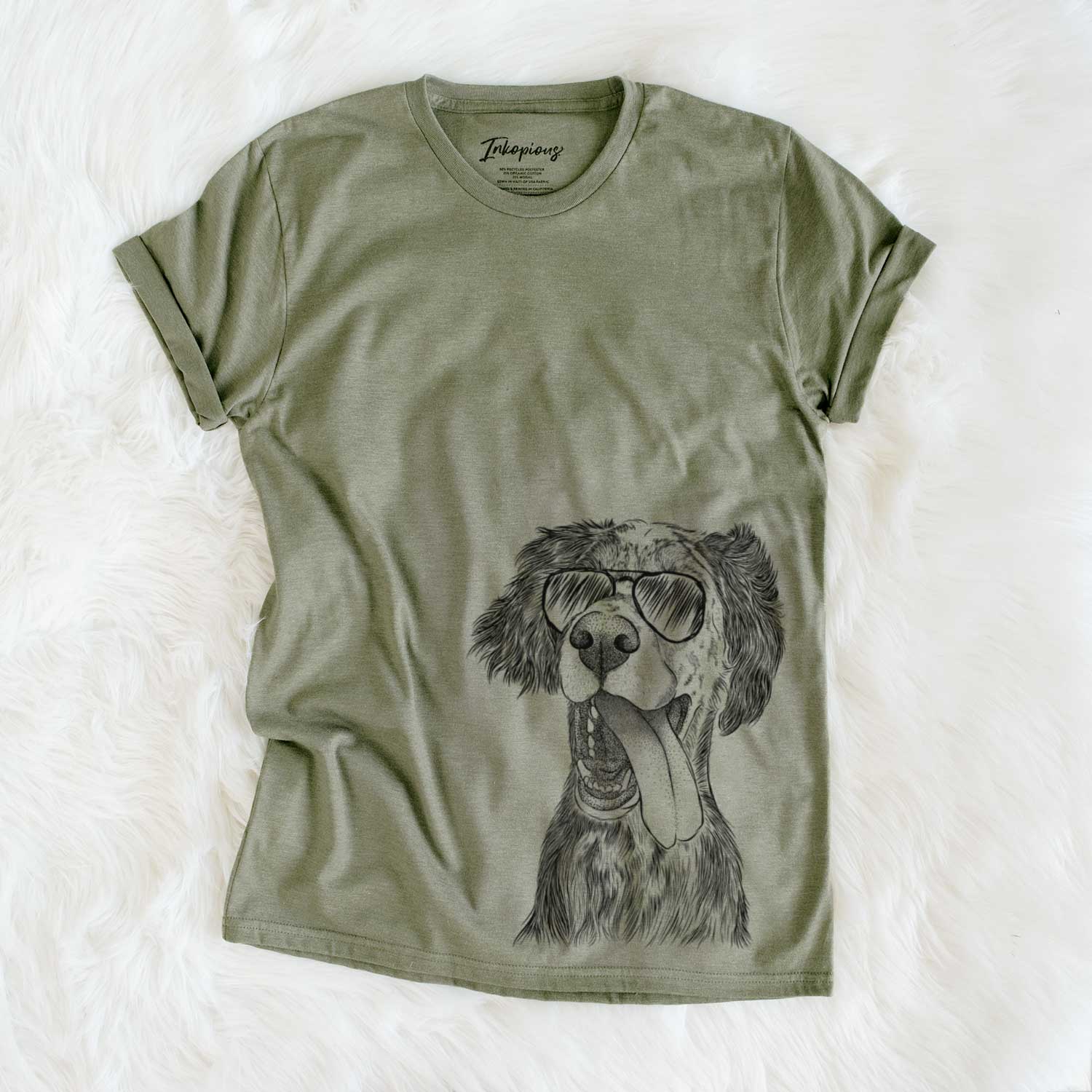 Hand-drawn sketch of Renly the English Setter wearing aviator sunglasses on an Olive Unisex crewneck