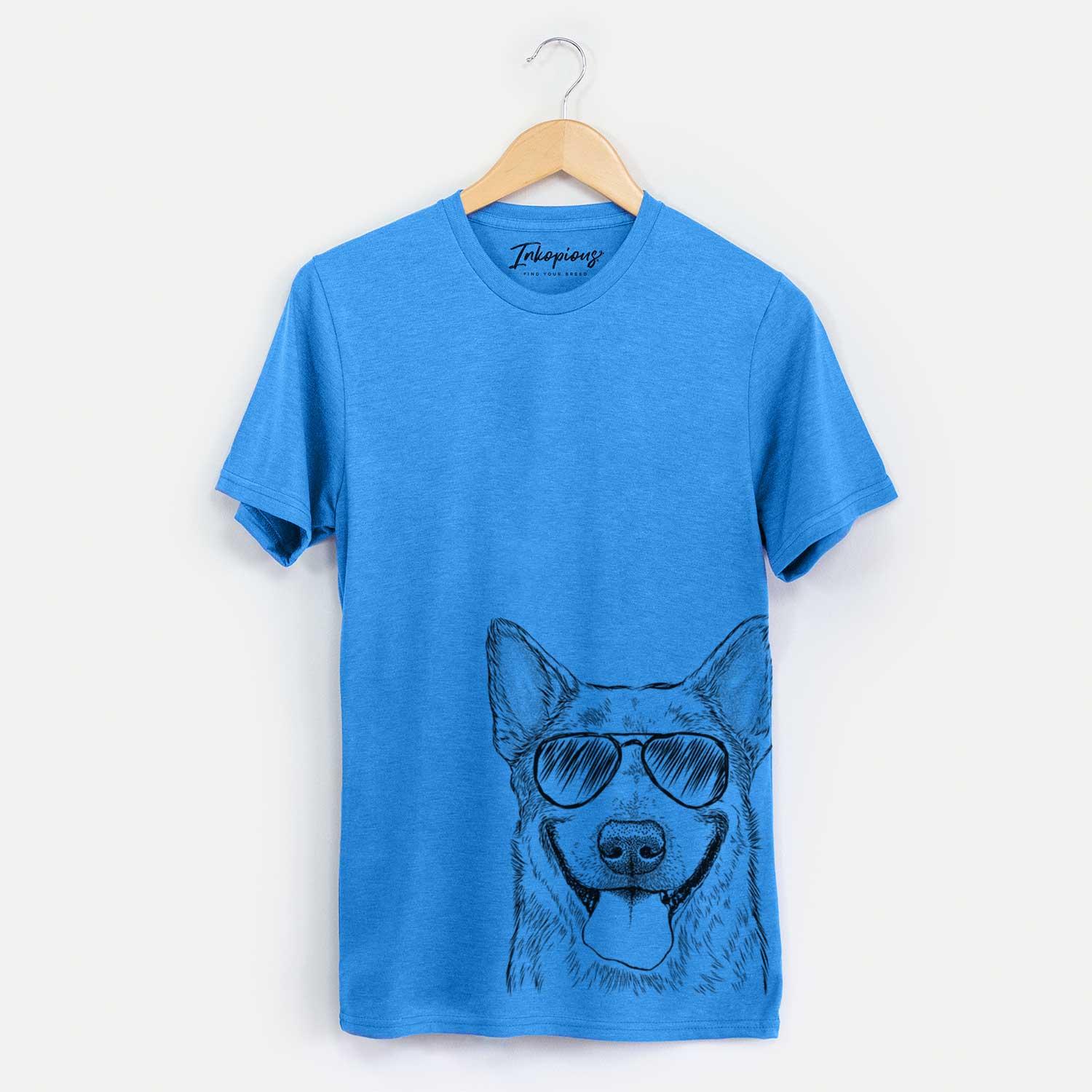 Hand-drawn sketch of Rio the Australian Cattle Dog wearing aviator sunglasses on a Blue Unisex crewneck