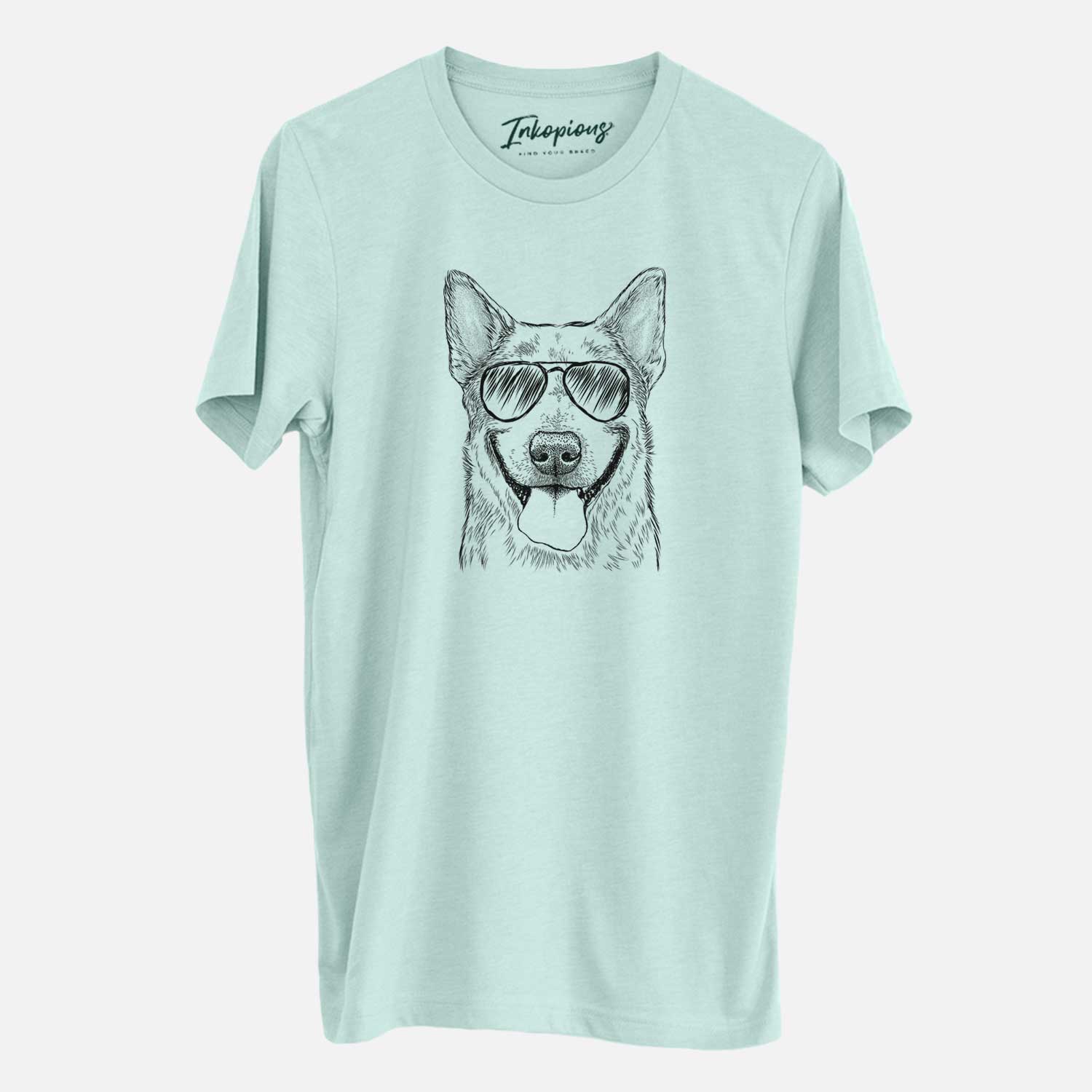 Hand-drawn sketch of Rio the Australian Cattle Dog wearing aviator sunglasses on a Heather Sage Unisex crewneck