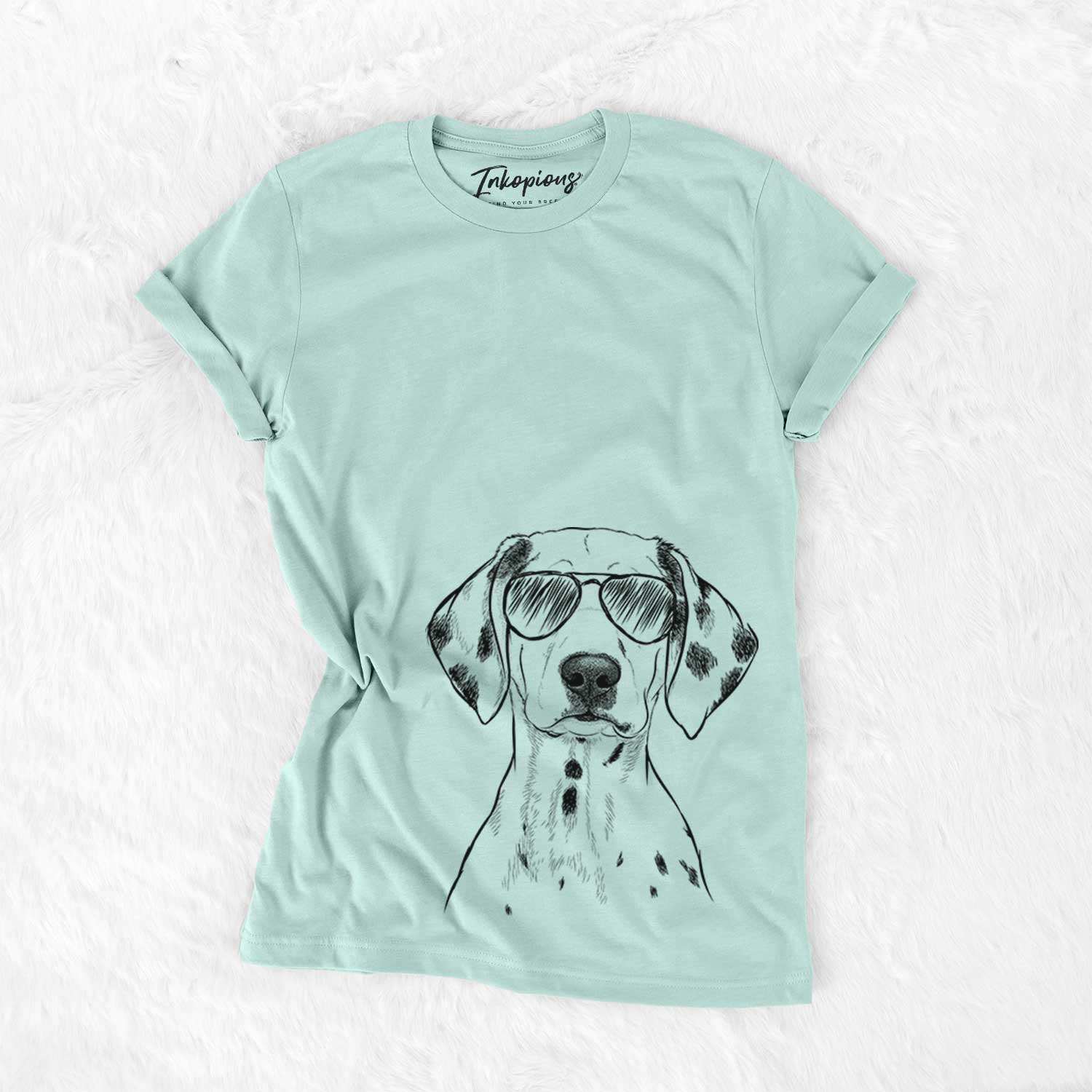 Hand-drawn sketch of Riot the Dalmatian wearing aviator sunglasses on a Heather Sage Unisex crewneck