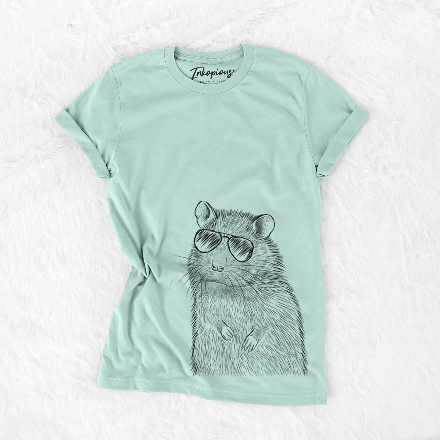 Hand-drawn sketch of Rizzo the Rat wearing aviator sunglasses on a Heather Sage Unisex crewneck
