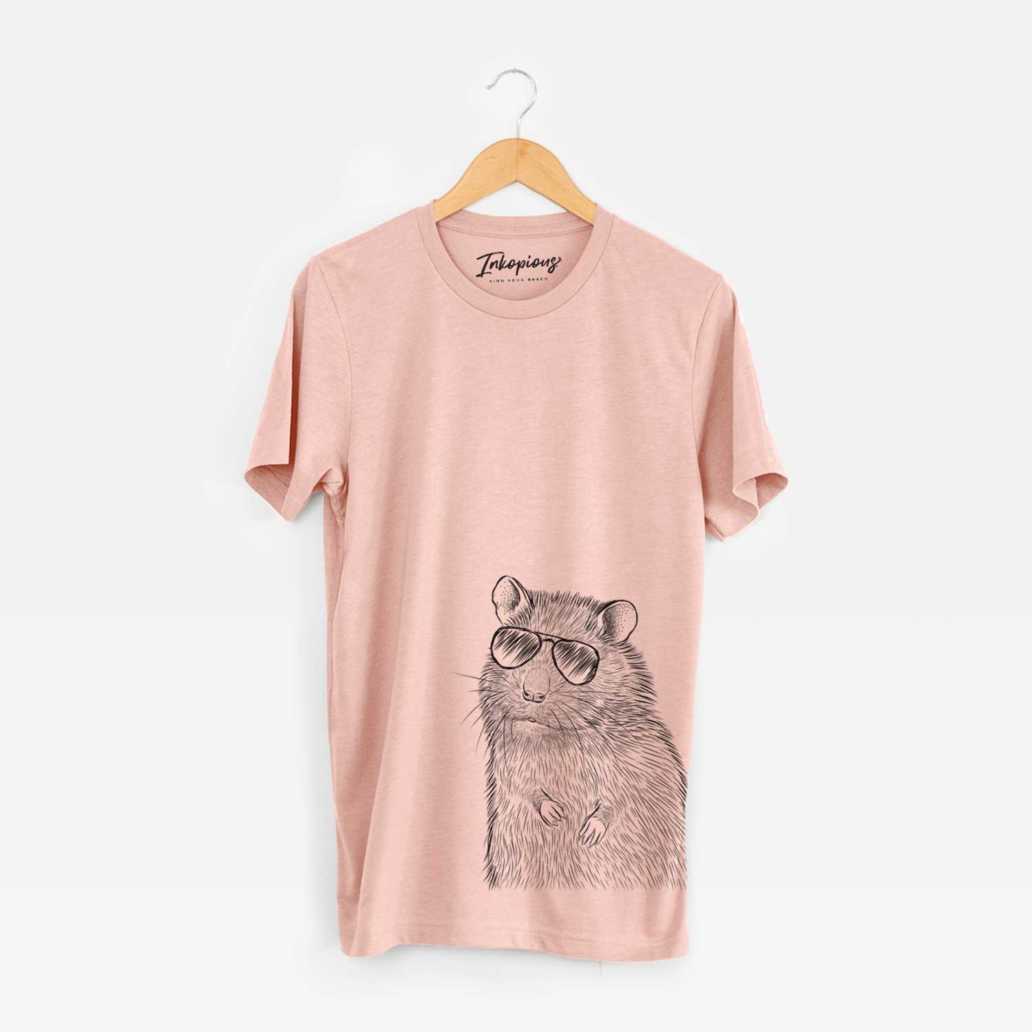 Hand-drawn sketch of Rizzo the Rat wearing aviator sunglasses on a Peach Unisex crewneck