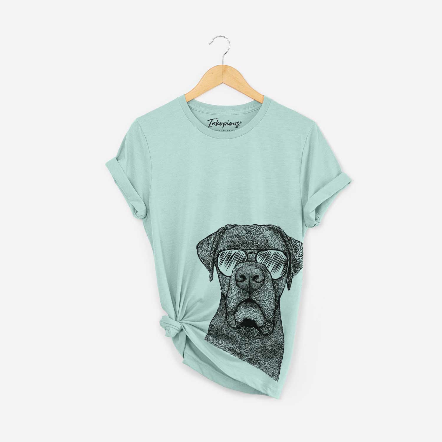 Hand-drawn sketch of Rocco the Cane Corso wearing aviator sunglasses on a Heather Sage Bella Canvas Unisex Crewneck