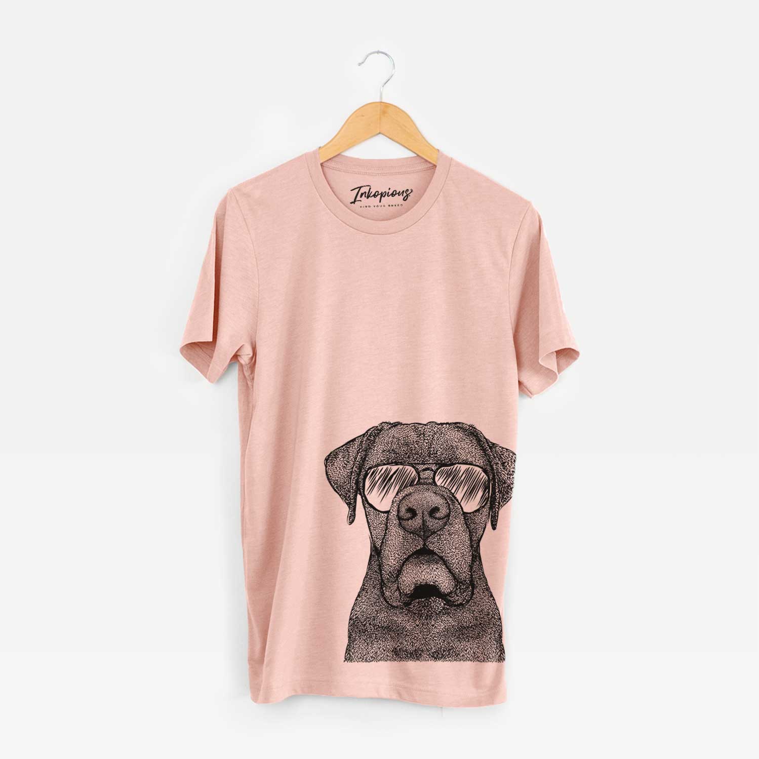 Hand-drawn sketch of Rocco the Cane Corso wearing aviator sunglasses on a Peach Bella Canvas Unisex Crewneck