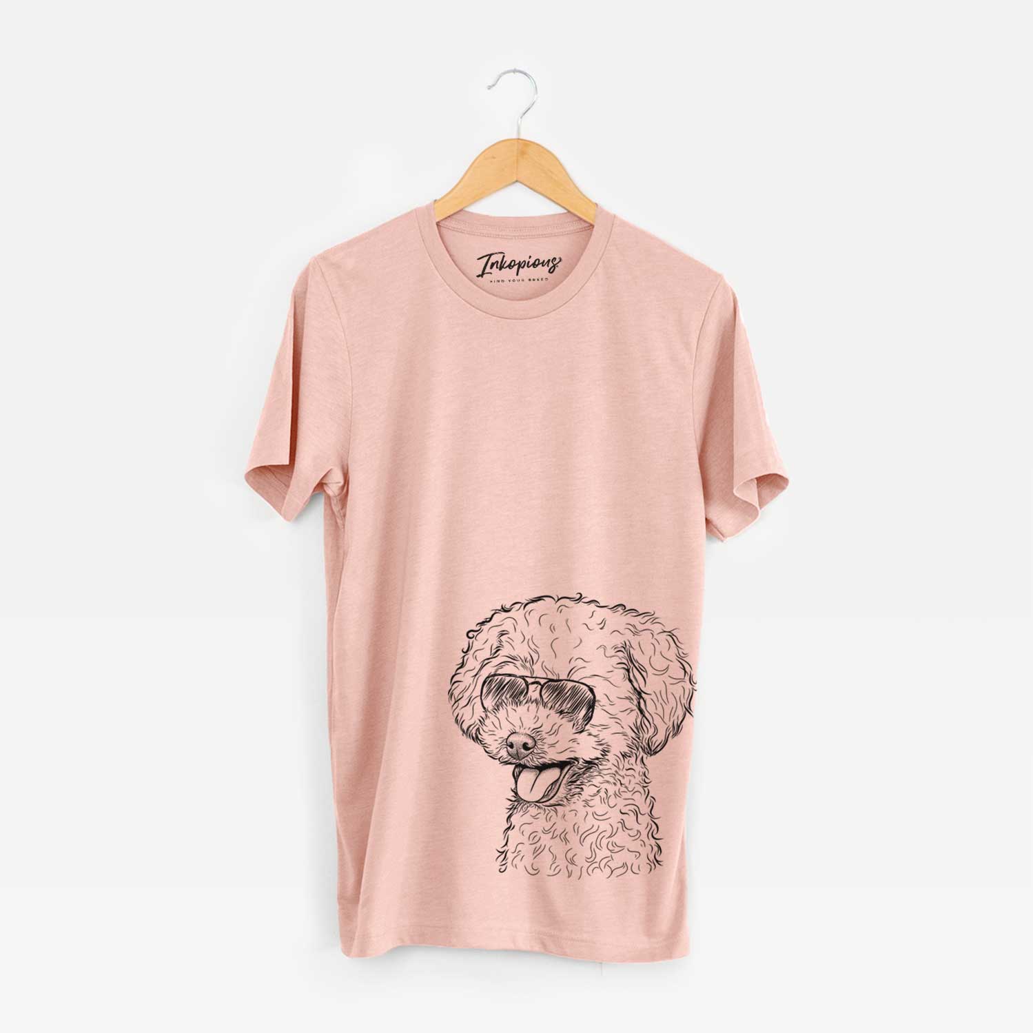 Hand-drawn sketch of Rocky the Teacup Poodle wearing aviator sunglasses on a Peach Unisex crewneck