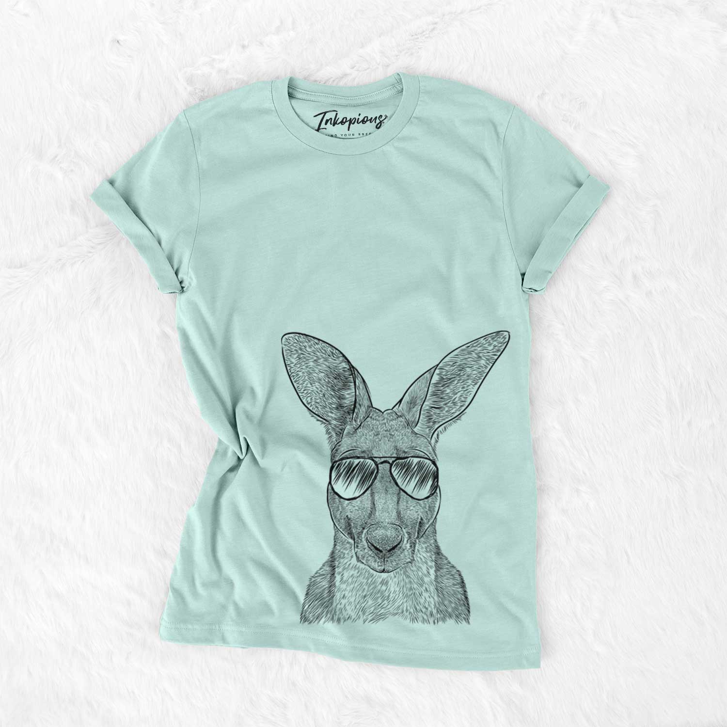 Hand-drawn sketch of Roger the Red Kangaroo wearing aviator sunglasses on a Heather Sage Unisex crewneck