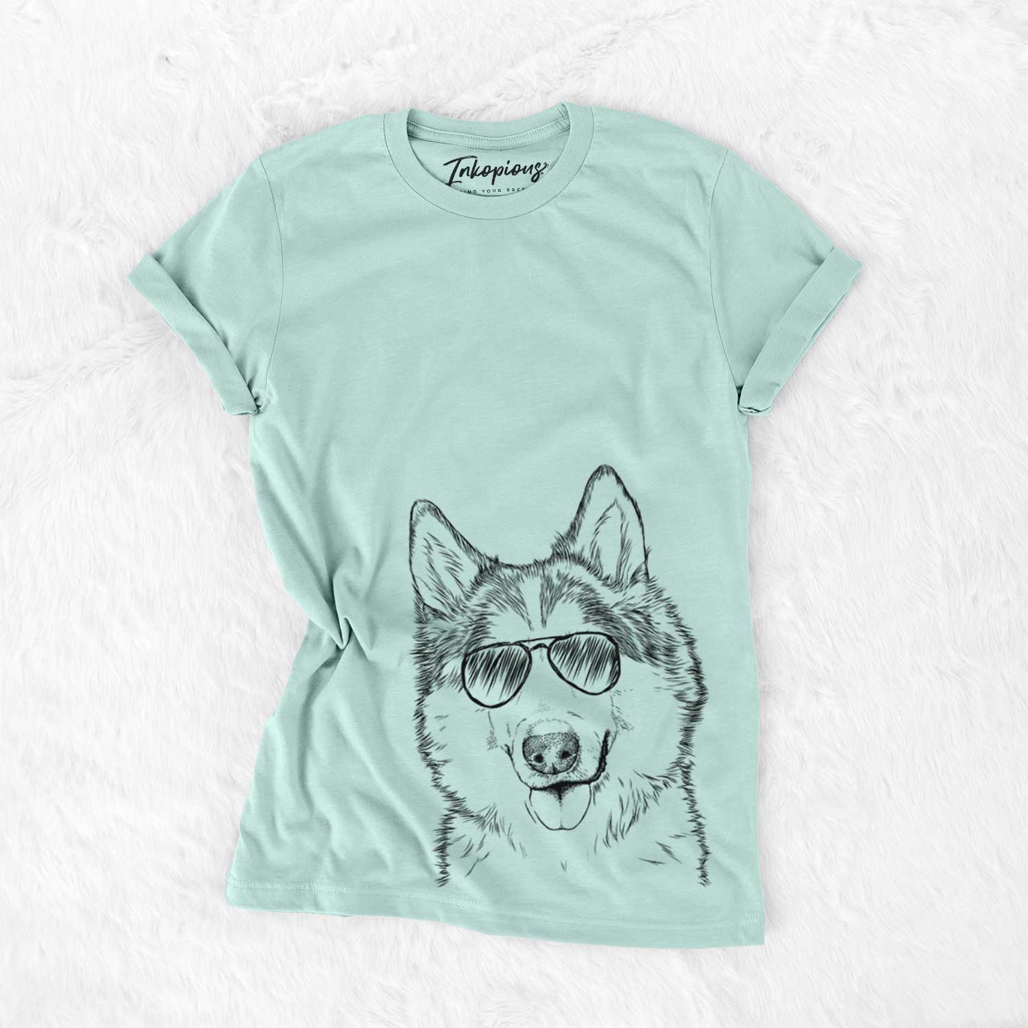 Hand-drawn sketch of Roshi the Mixed Breed wearing aviator sunglasses on a Heather Sage Unisex crewneck