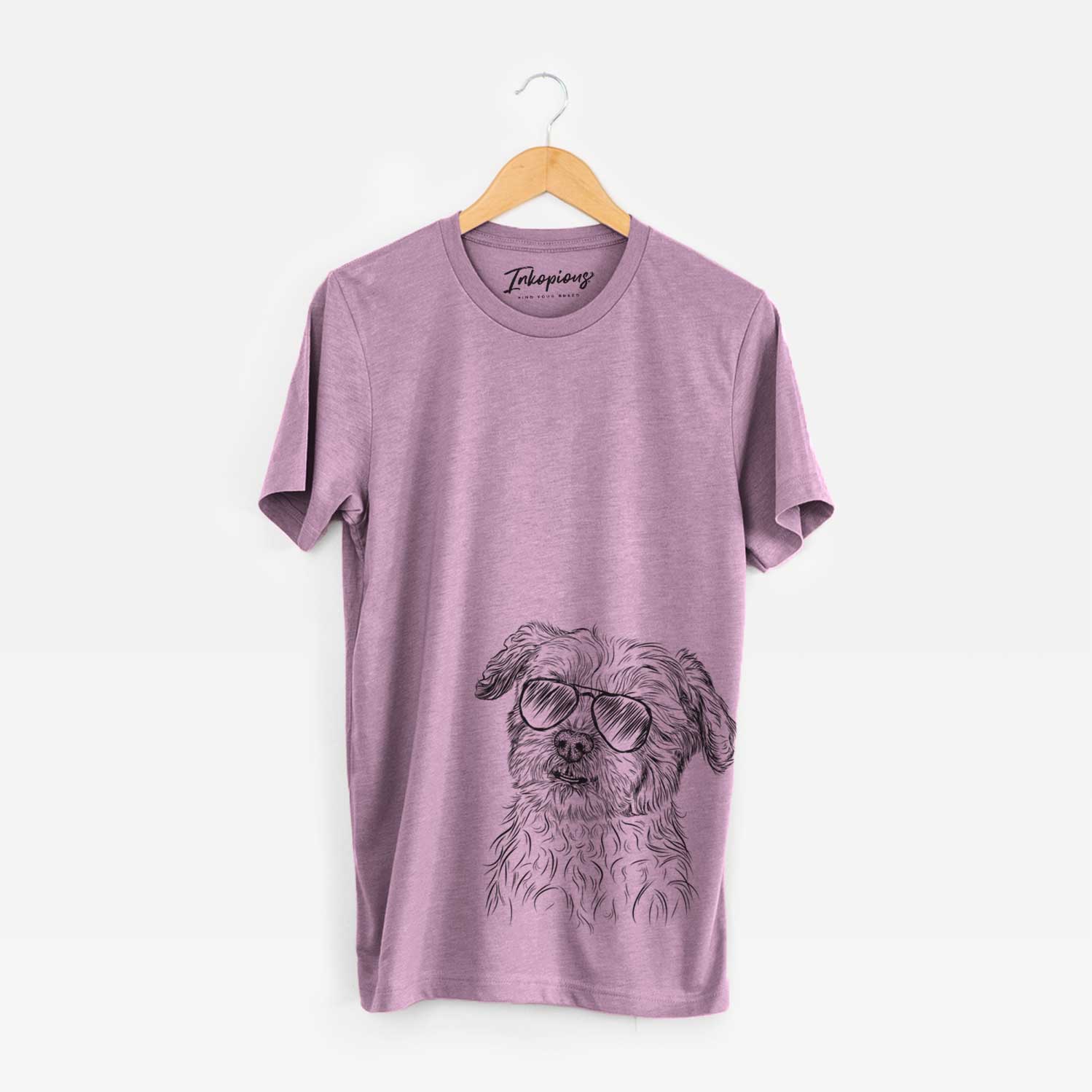 Hand-drawn sketch of Roxie the Schnauzer Shih Tzu Mix wearing aviator sunglasses on an Orchid Unisex crewneck