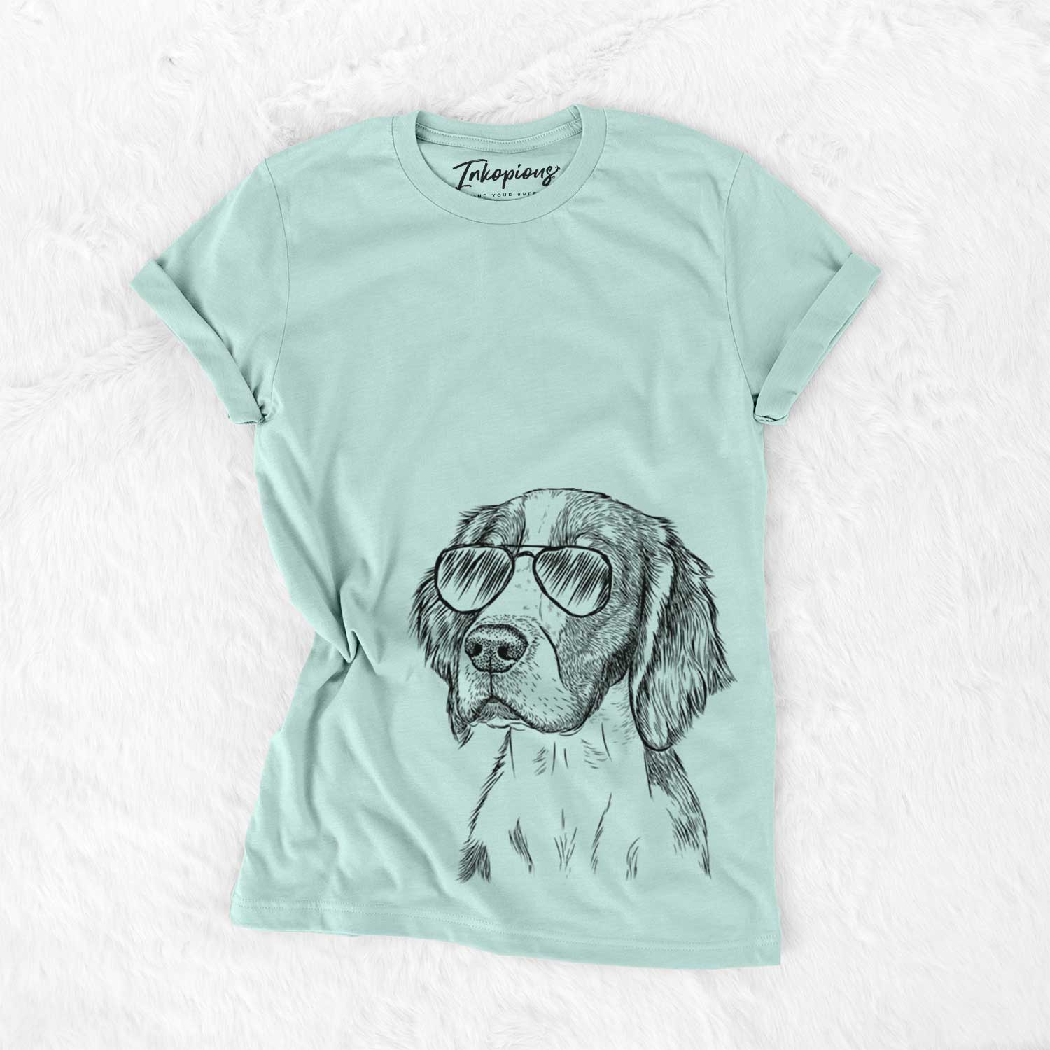 Hand-drawn sketch of Roxy the Welsh Springer Spaniel wearing aviator sunglasses on a Heather Sage Unisex crewneck