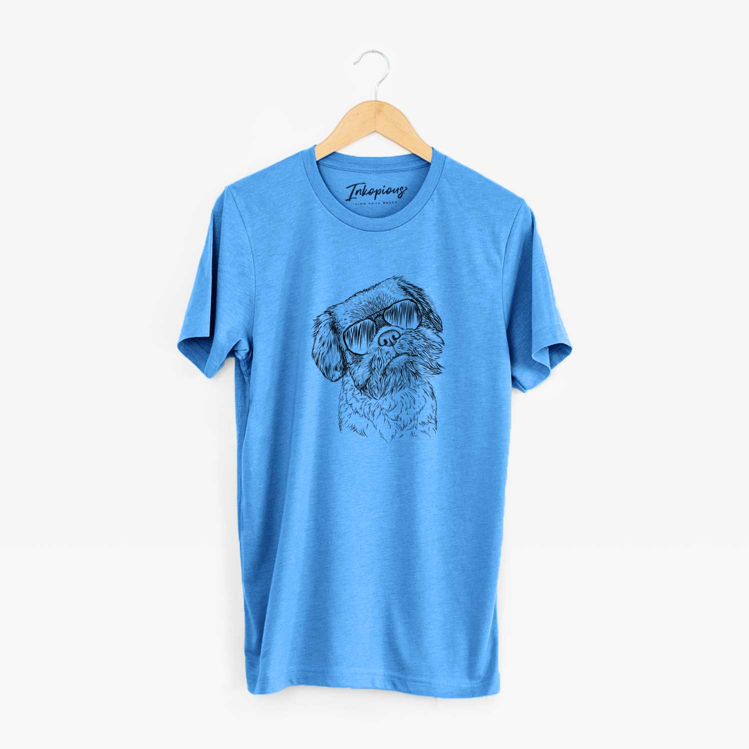 Hand-drawn sketch of Rufus the Shiffon wearing aviator sunglasses on a Blue Unisex crewneck