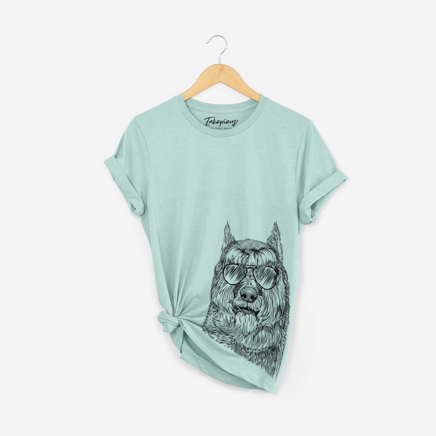 Hand-drawn sketch of Sabre the Bouvier des Flandres wearing aviator sunglasses on a Heather Sage Bella Canvas Unisex Crewneck