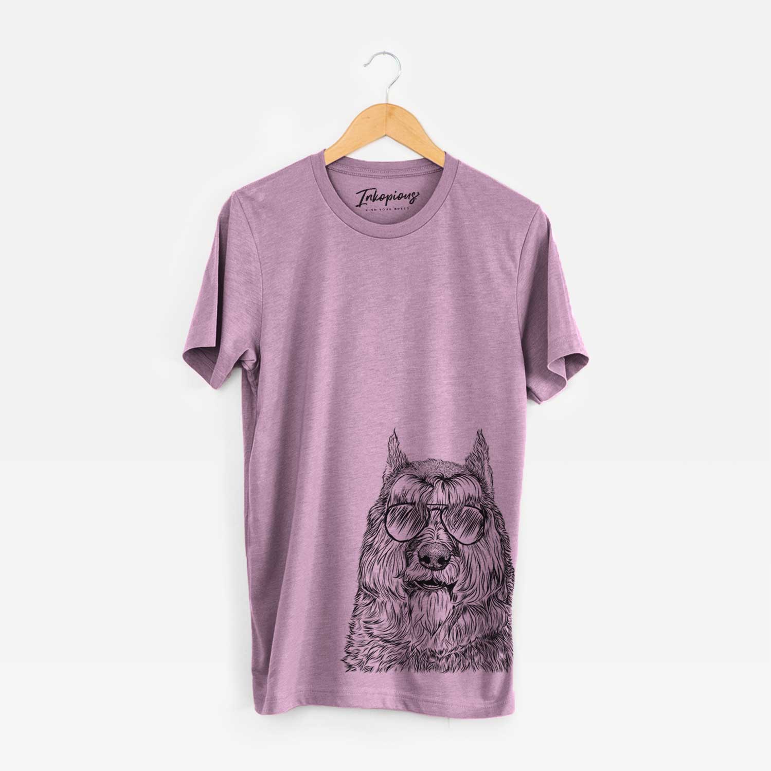 Hand-drawn sketch of Sabre the Bouvier des Flandres wearing aviator sunglasses on an Orchid Bella Canvas Unisex Crewneck