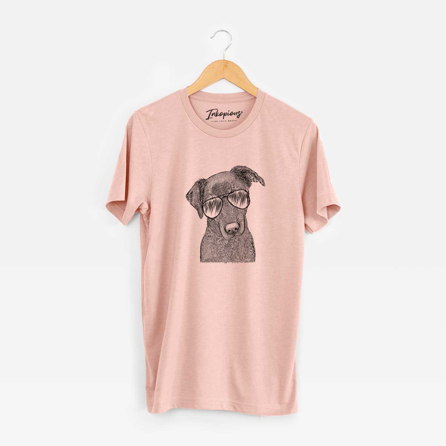 Hand-drawn sketch of Sadie the Whipador wearing aviator sunglasses on a Peach Unisex crewneck