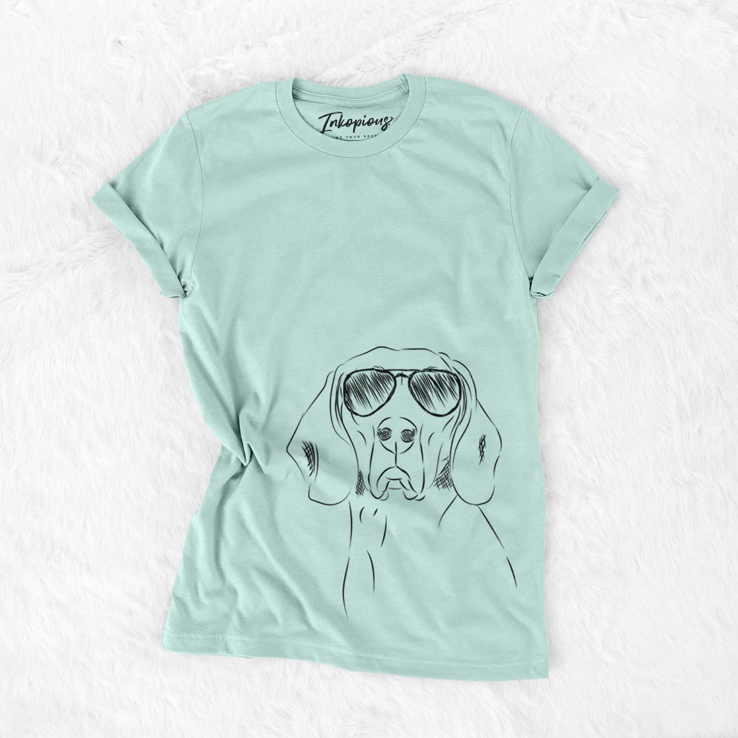 Hand-drawn sketch of Sagan the Coonhound wearing aviator sunglasses on a Heather Sage Unisex crewneck