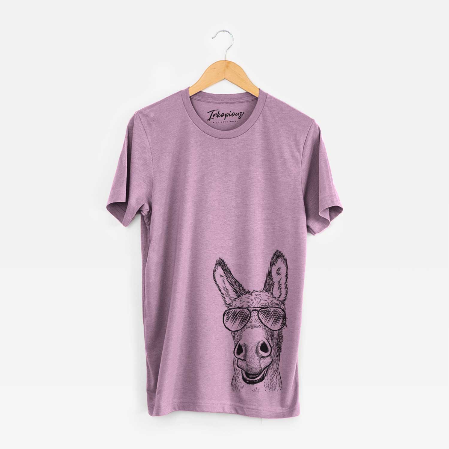 Hand-drawn sketch of Samule the Donkey wearing aviator sunglasses on an Orchid Bella Canvas Unisex Crewneck