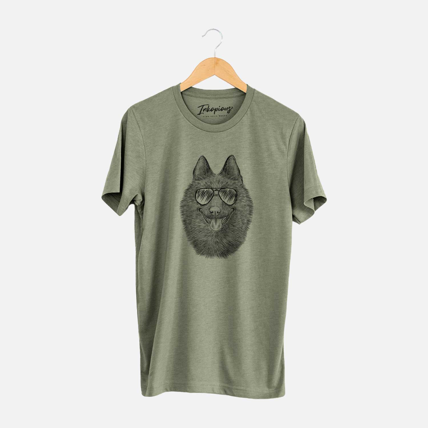 Hand-drawn sketch of Sander the Schipperke wearing aviator sunglasses on an Olive Unisex crewneck