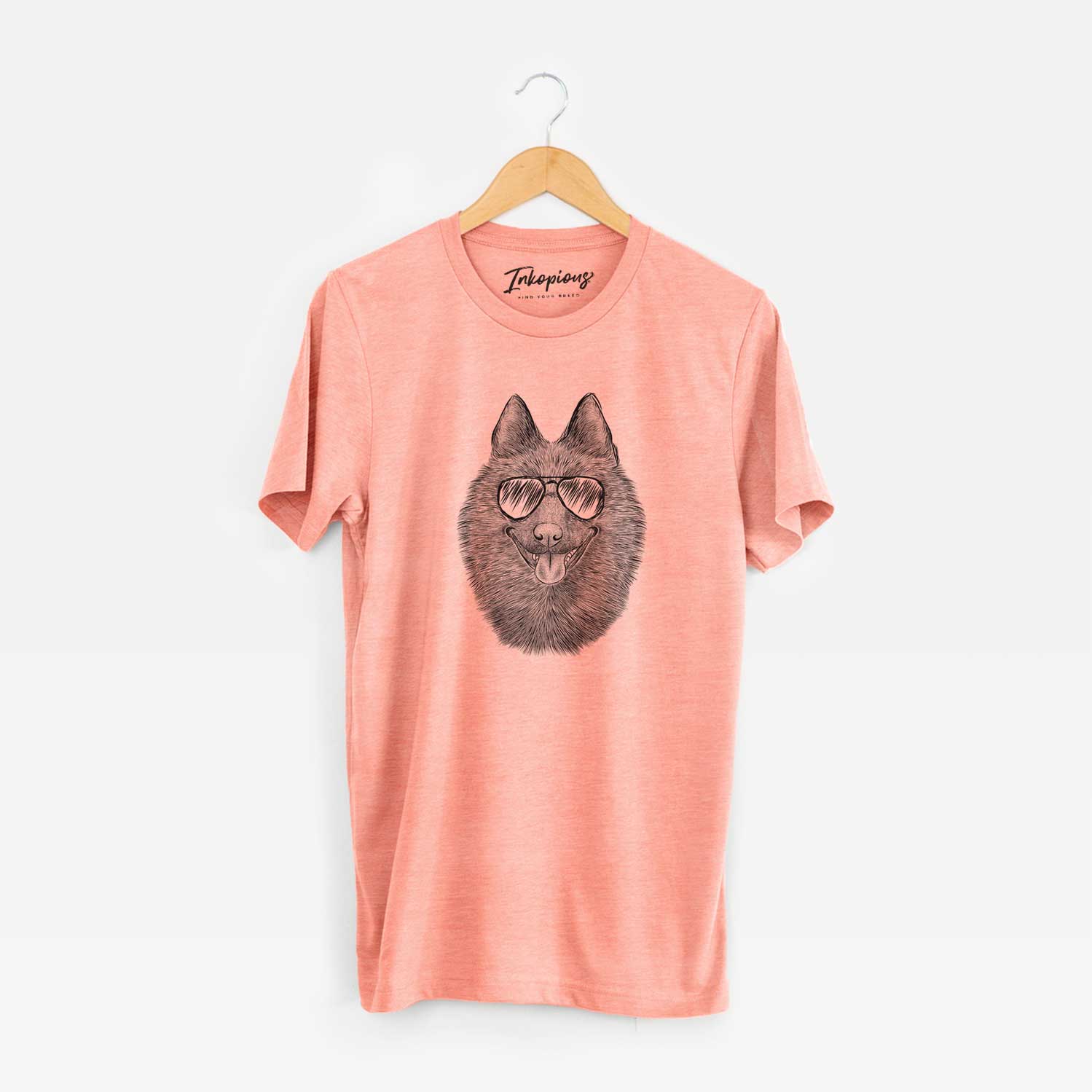 Hand-drawn sketch of Sander the Schipperke wearing aviator sunglasses on a Sunset Unisex crewneck