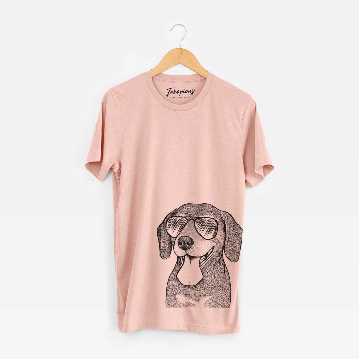 Hand-drawn sketch of Scarlett the Beagle wearing aviator sunglasses on a Peach Bella Canvas Unisex Crewneck