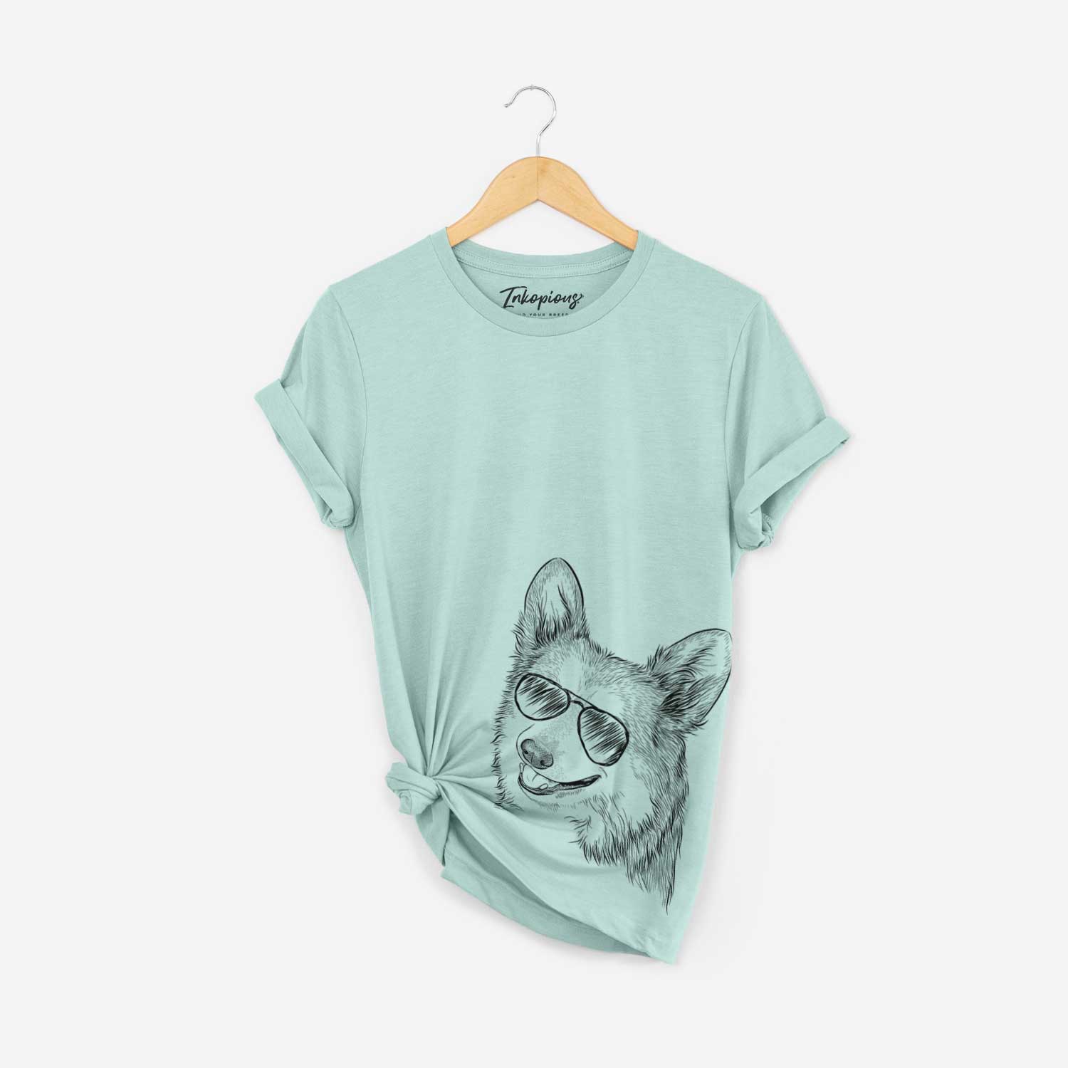 Hand-drawn sketch of Scout the Pembroke Welsh Corgi wearing aviator sunglasses on a Heather Sage Bella Canvas Unisex Crewneck