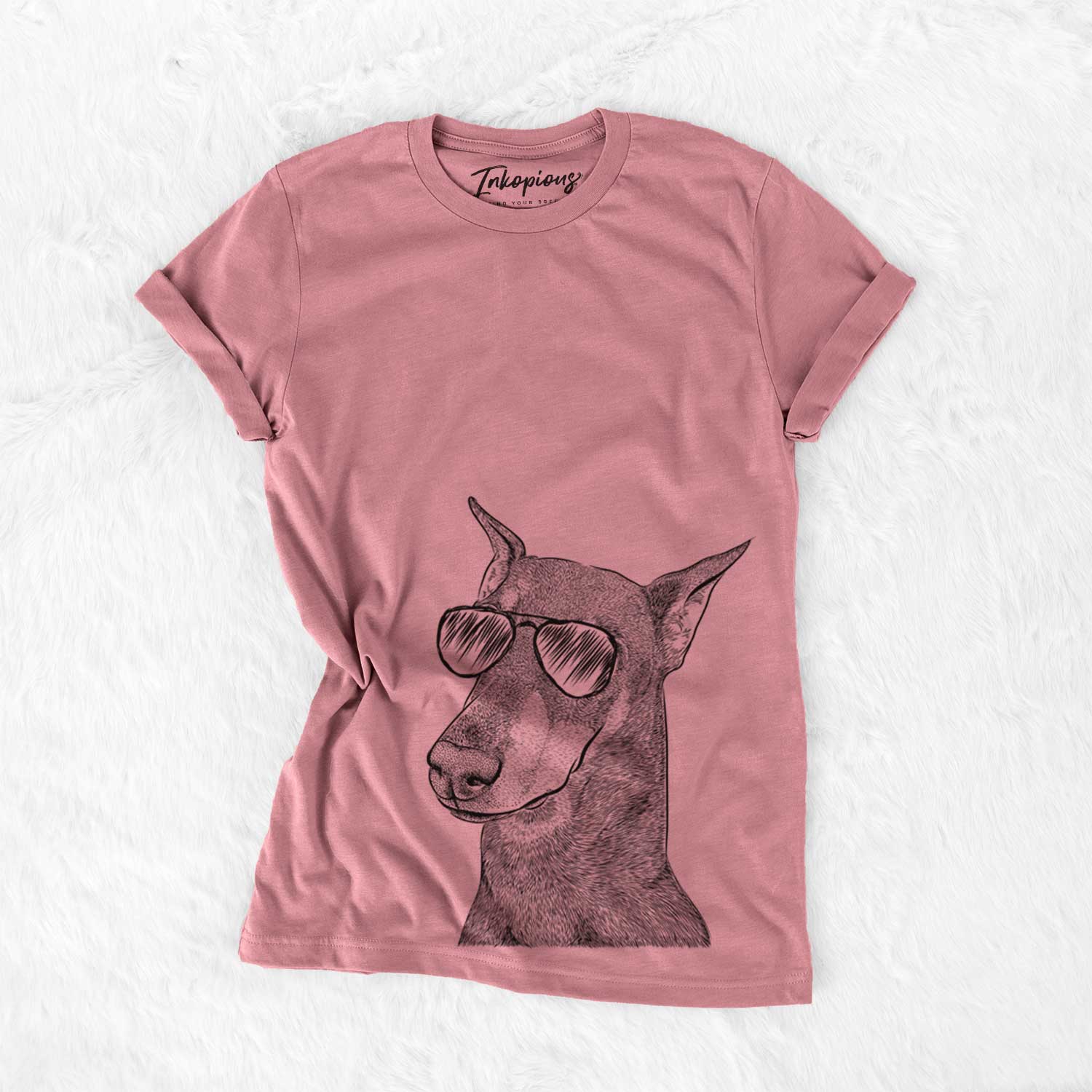 Hand-drawn sketch of Shelby the Doberman Pinscher wearing aviator sunglasses on a Mauve Bella Canvas Unisex Crewneck
