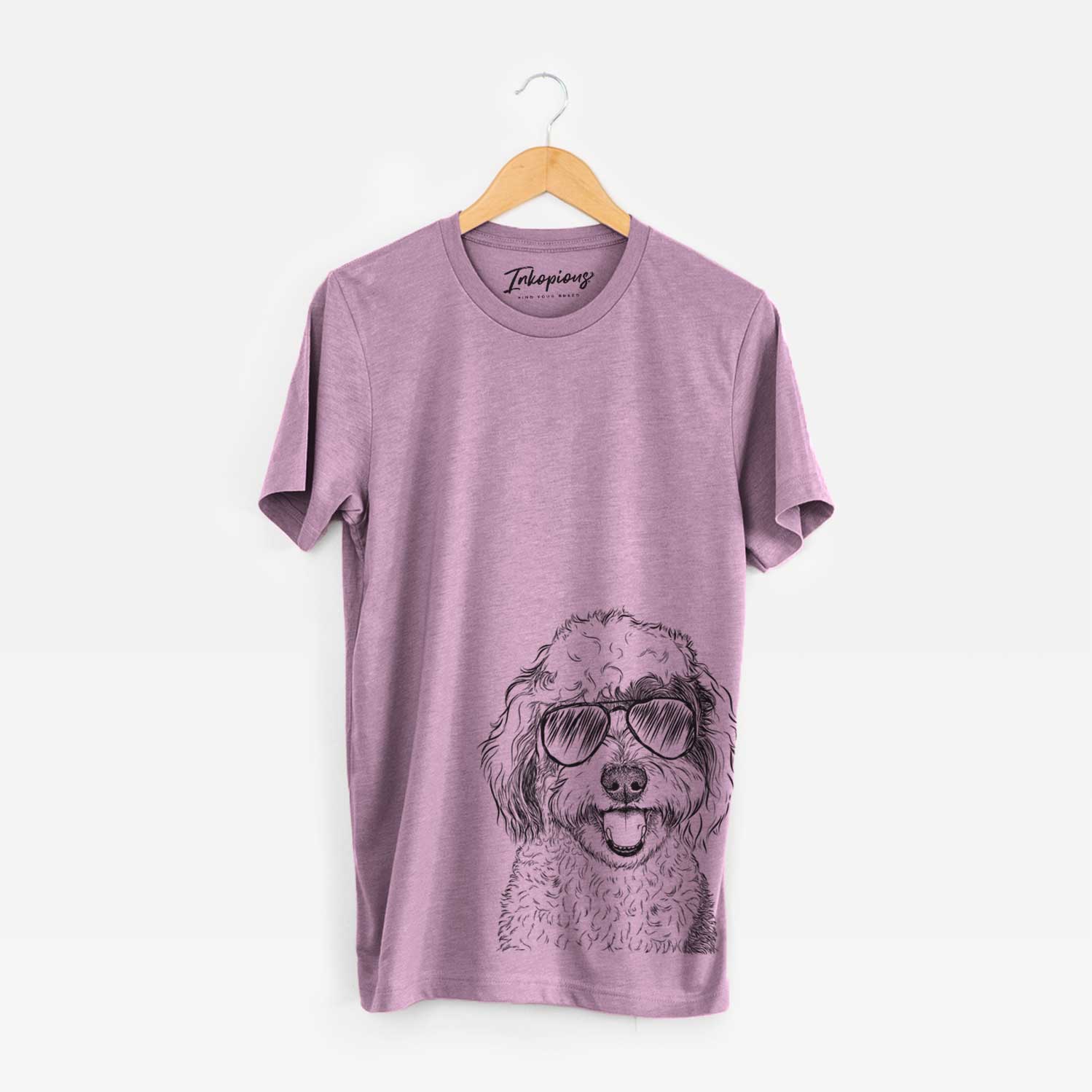Hand-drawn sketch of Sherlock the Sheepadoodle wearing aviator sunglasses on an Orchid Bella Canvas Unisex Crewneck