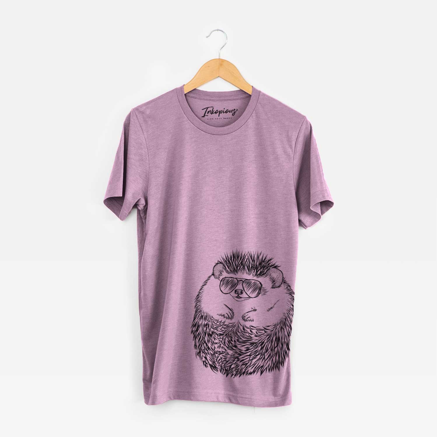 Hand-drawn sketch of Sid the Hedgehog wearing aviator sunglasses on an Orchid Bella Canvas Unisex Crewneck