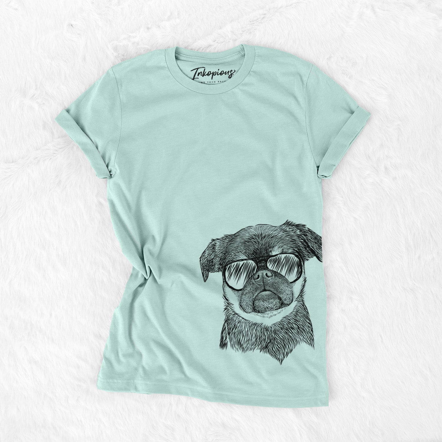 Hand-drawn sketch of Simone the Brussels Griffon wearing aviator sunglasses on a Heather Sage Unisex crewneck
