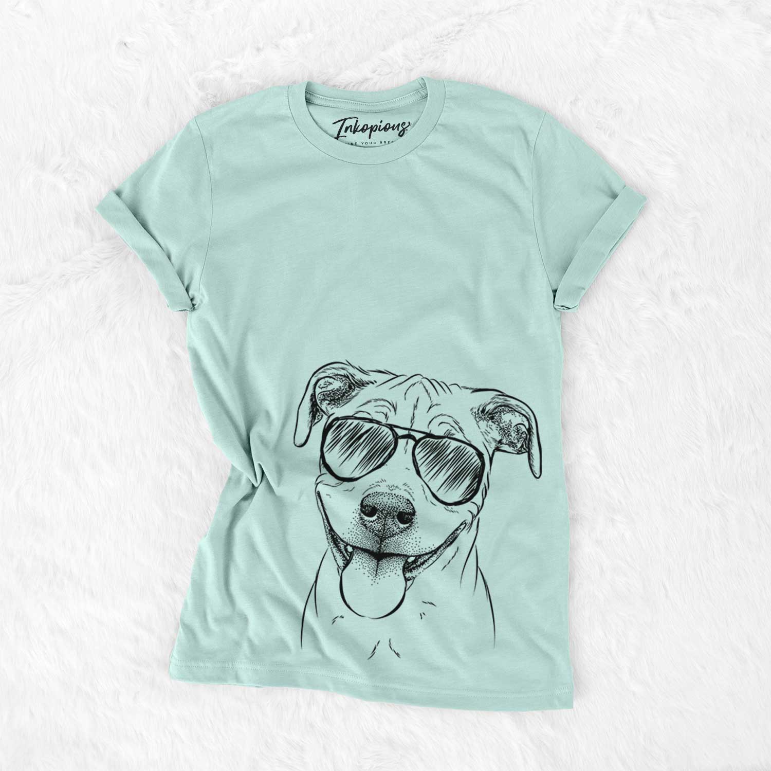 Hand-drawn sketch of Skye the Pitweiler wearing aviator sunglasses on a Heather Sage Unisex crewneck