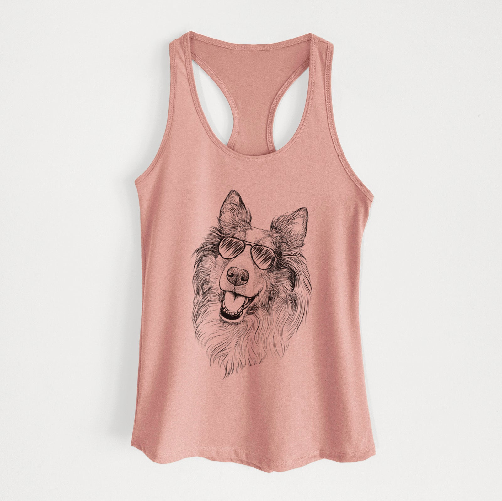 Hand-drawn sketch of Skylar the Shetland Sheepdog wearing aviator sunglasses on a Desert Pink Women's racerback tanktop