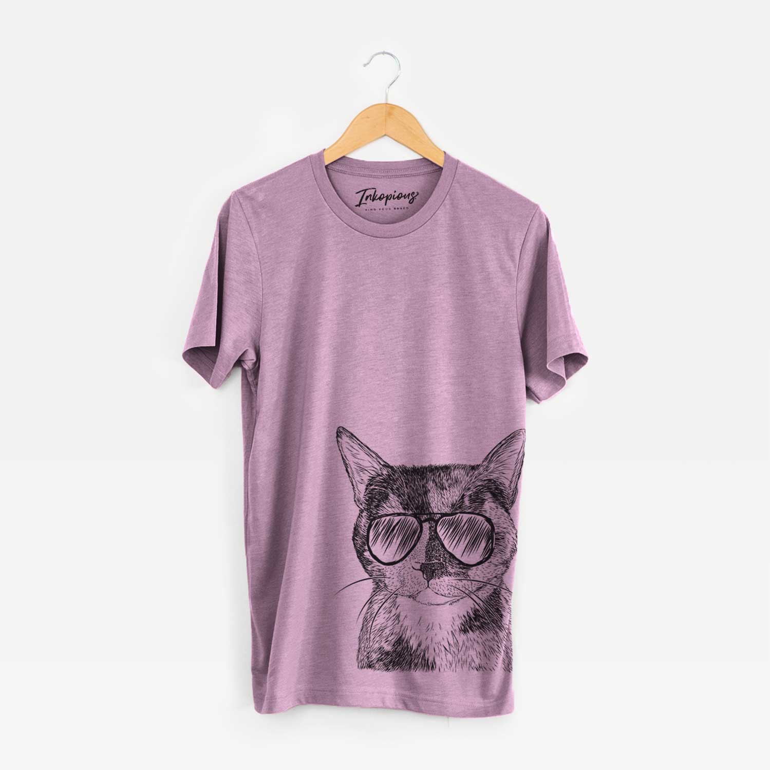 Hand-drawn sketch of Spooky Kitty the Tortoiseshell Cat wearing aviator sunglasses on an Orchid Bella Canvas Unisex Crewneck