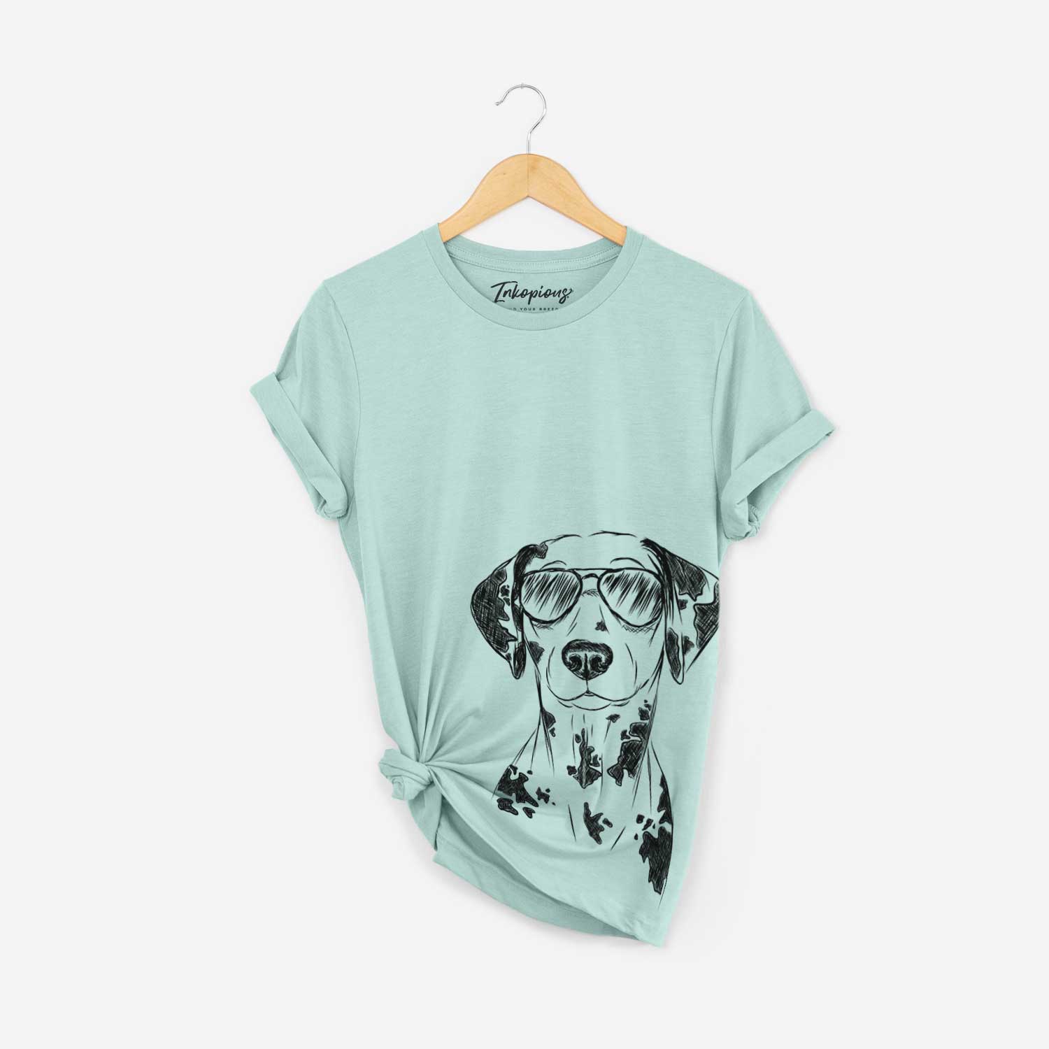 Hand-drawn sketch of Spot the Dalmatian wearing aviator sunglasses on a Heather Sage Bella Canvas Unisex Crewneck