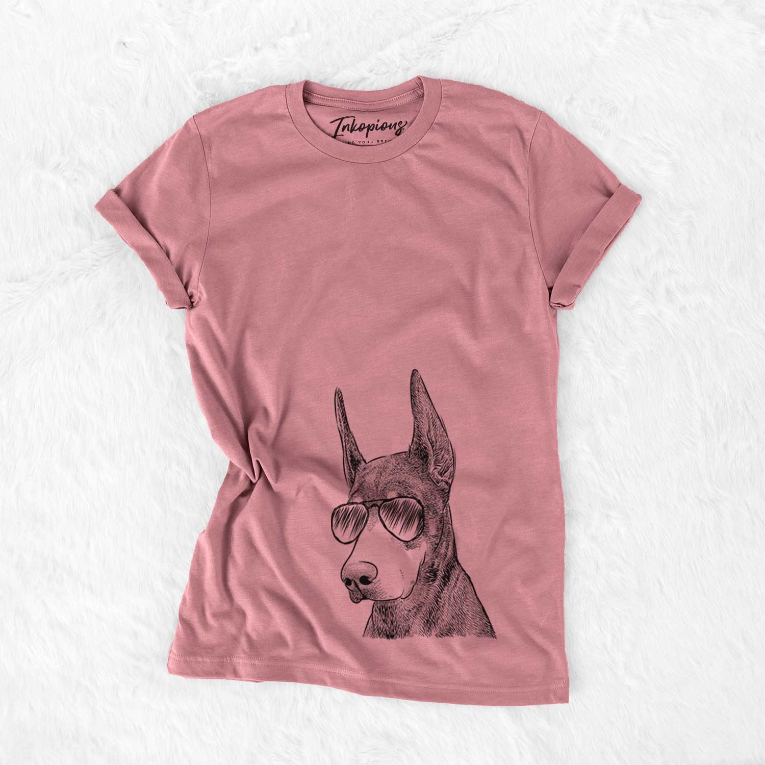 Hand-drawn sketch of Sunny the Doberman Pinscher wearing aviator sunglasses on a Mauve Bella Canvas Unisex Crewneck