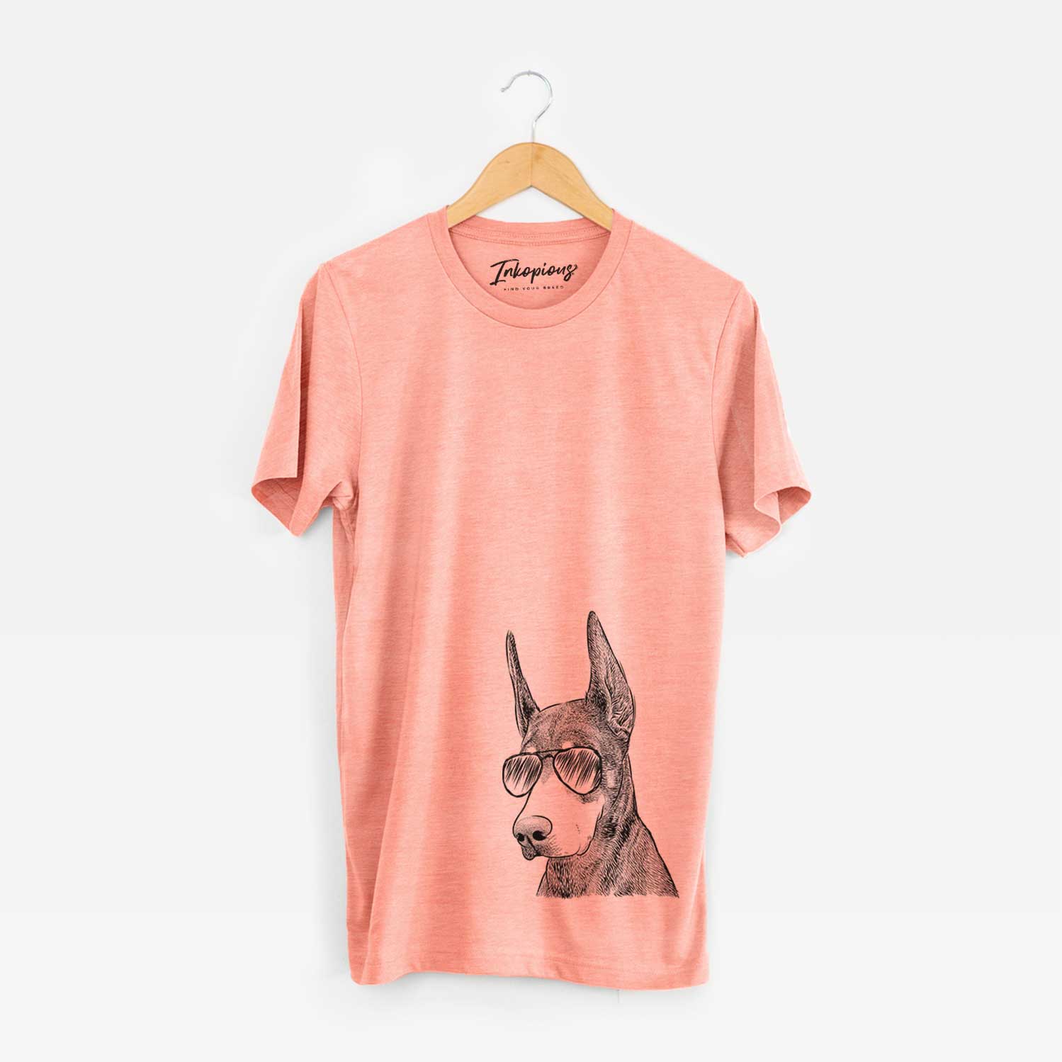 Hand-drawn sketch of Sunny the Doberman Pinscher wearing aviator sunglasses on a Sunset Unisex crewneck