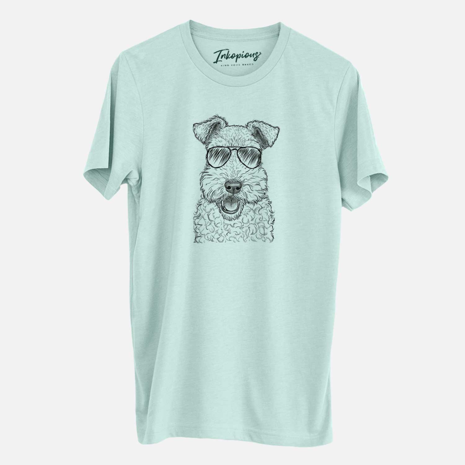 Hand-drawn sketch of Ted the Wire Fox Terrier wearing aviator sunglasses on a Heather Sage Unisex crewneck