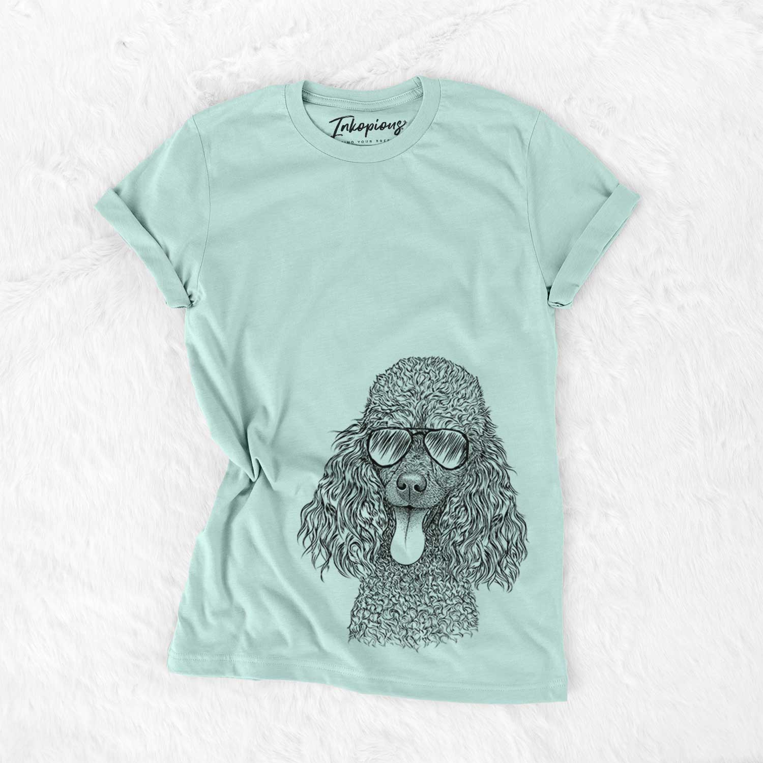 Hand-drawn sketch of Teddy the Mini Poodle wearing aviator sunglasses on a Heather Sage Unisex crewneck