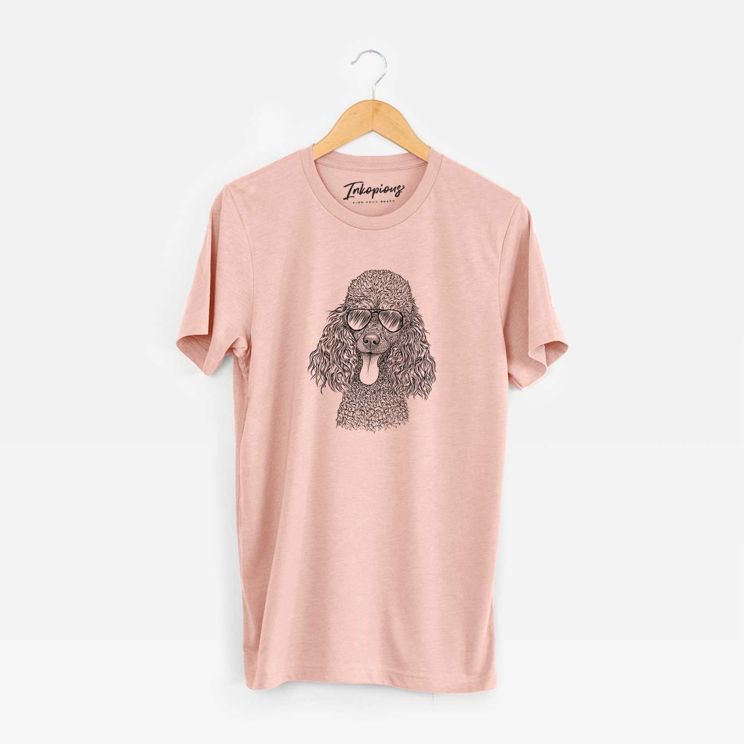 Hand-drawn sketch of Teddy the Mini Poodle wearing aviator sunglasses on a Peach Unisex crewneck